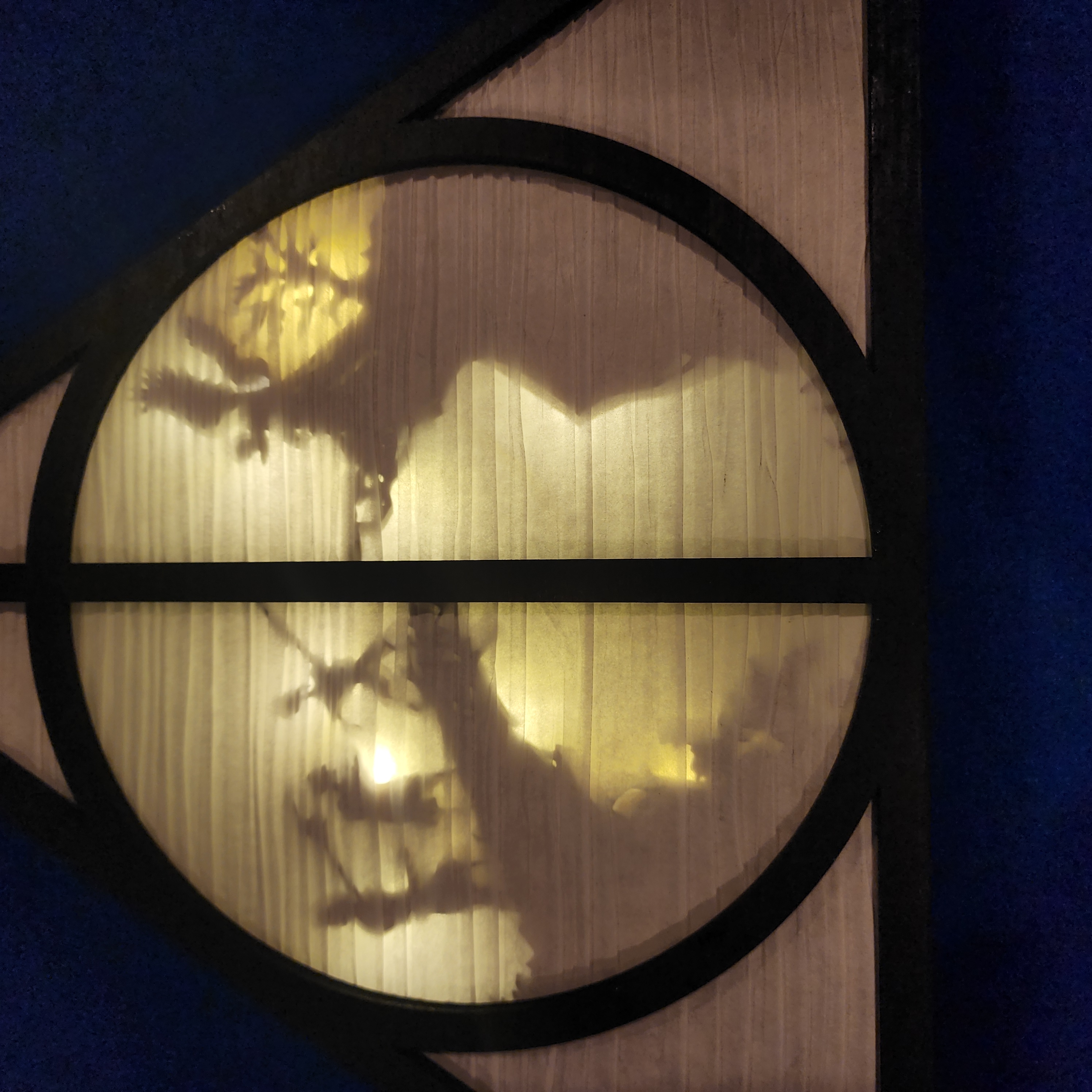 The Deathly Hallows Three Brothers Illuminated Emblem