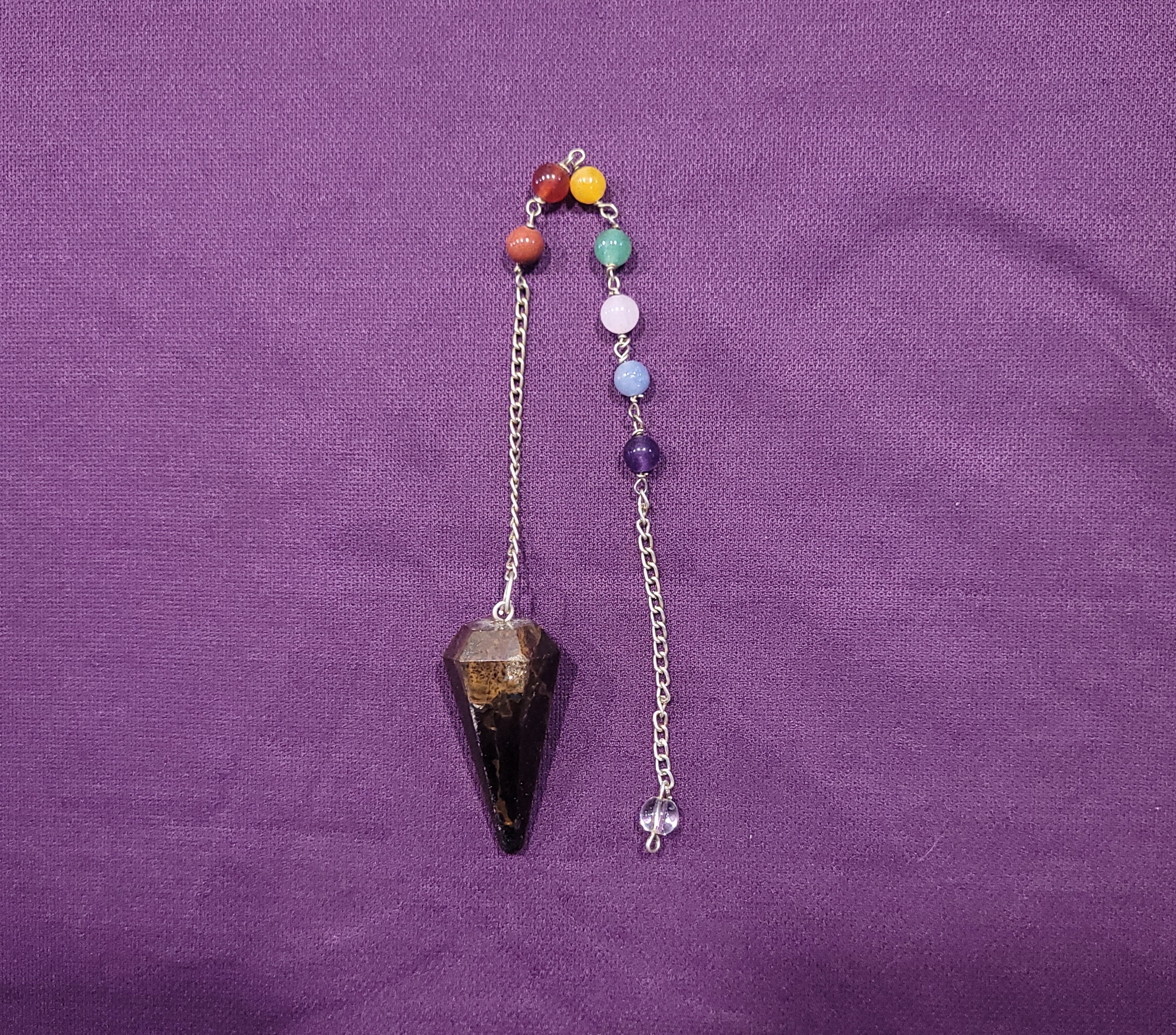 Péndulo de Mineral Ojo de Tigre y Siete Chakras