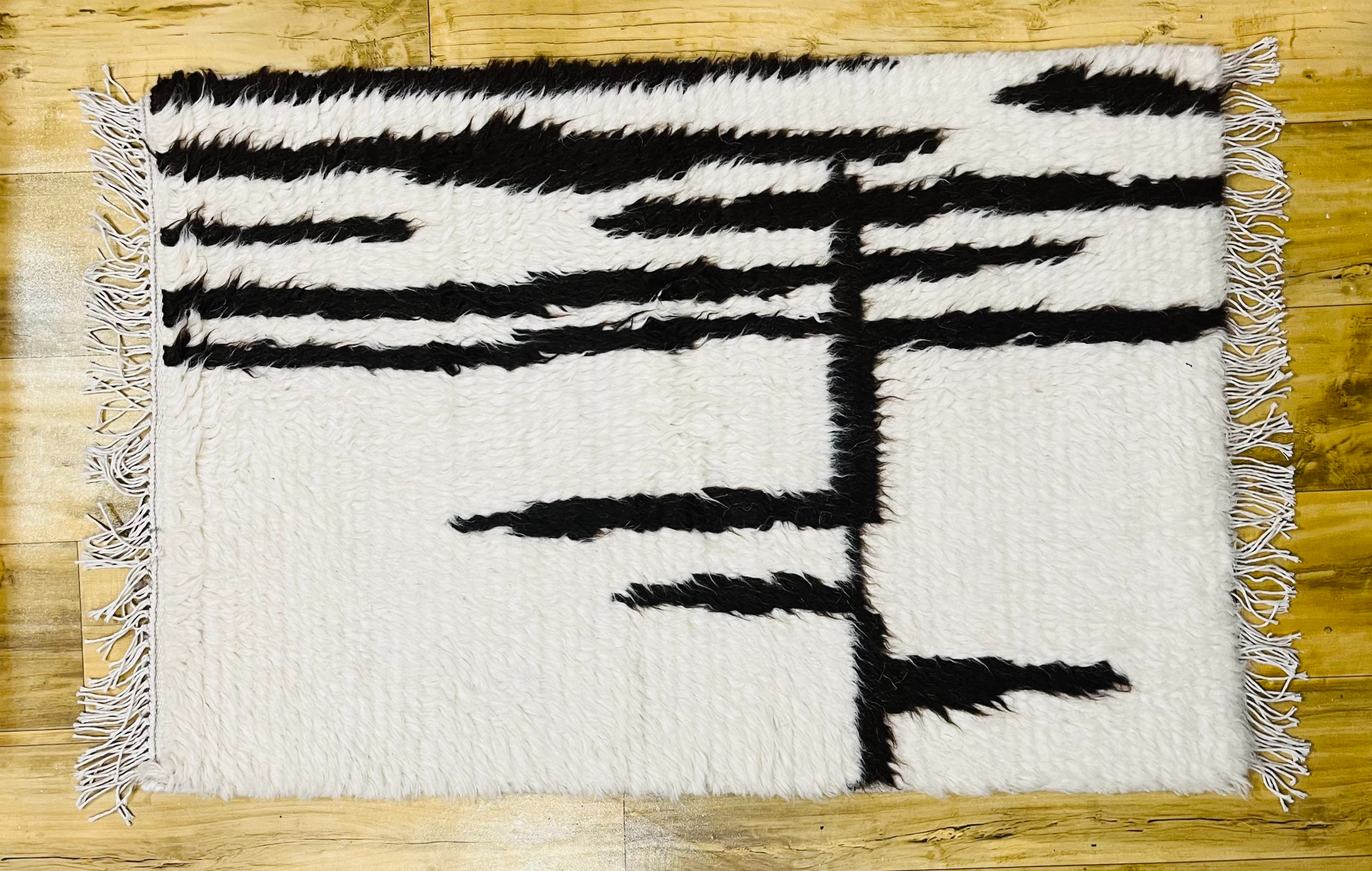 Hand-Woven Black and White Rug