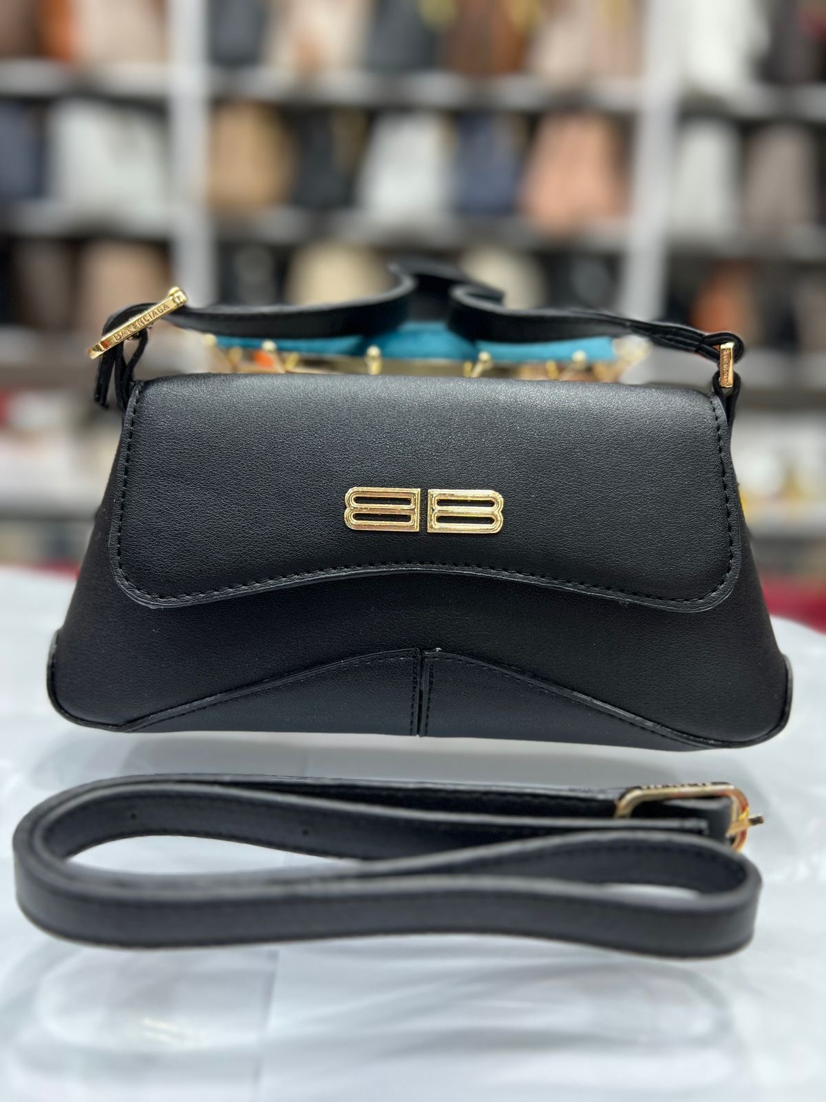 Black Handbag with Gold Accents