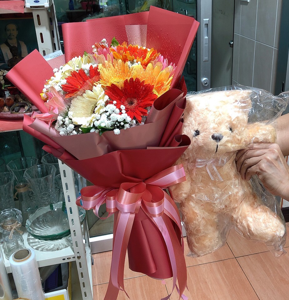 Bouquet of Flowers and Teddy Bear