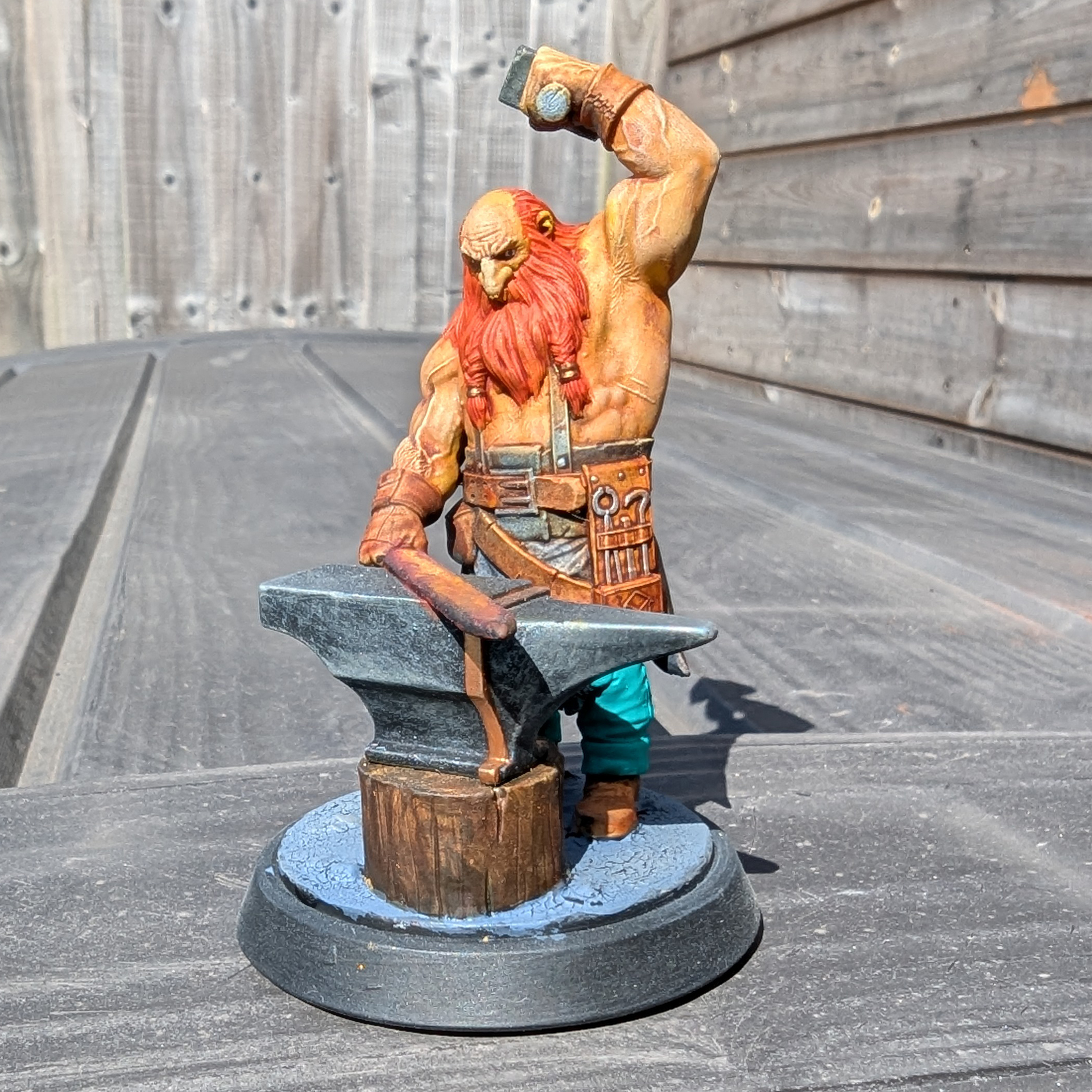 Painted Blacksmith Figurine