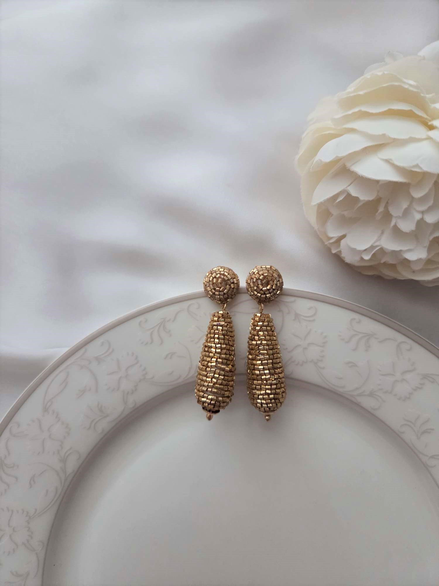 Besondere Ohrringe mit Perlen