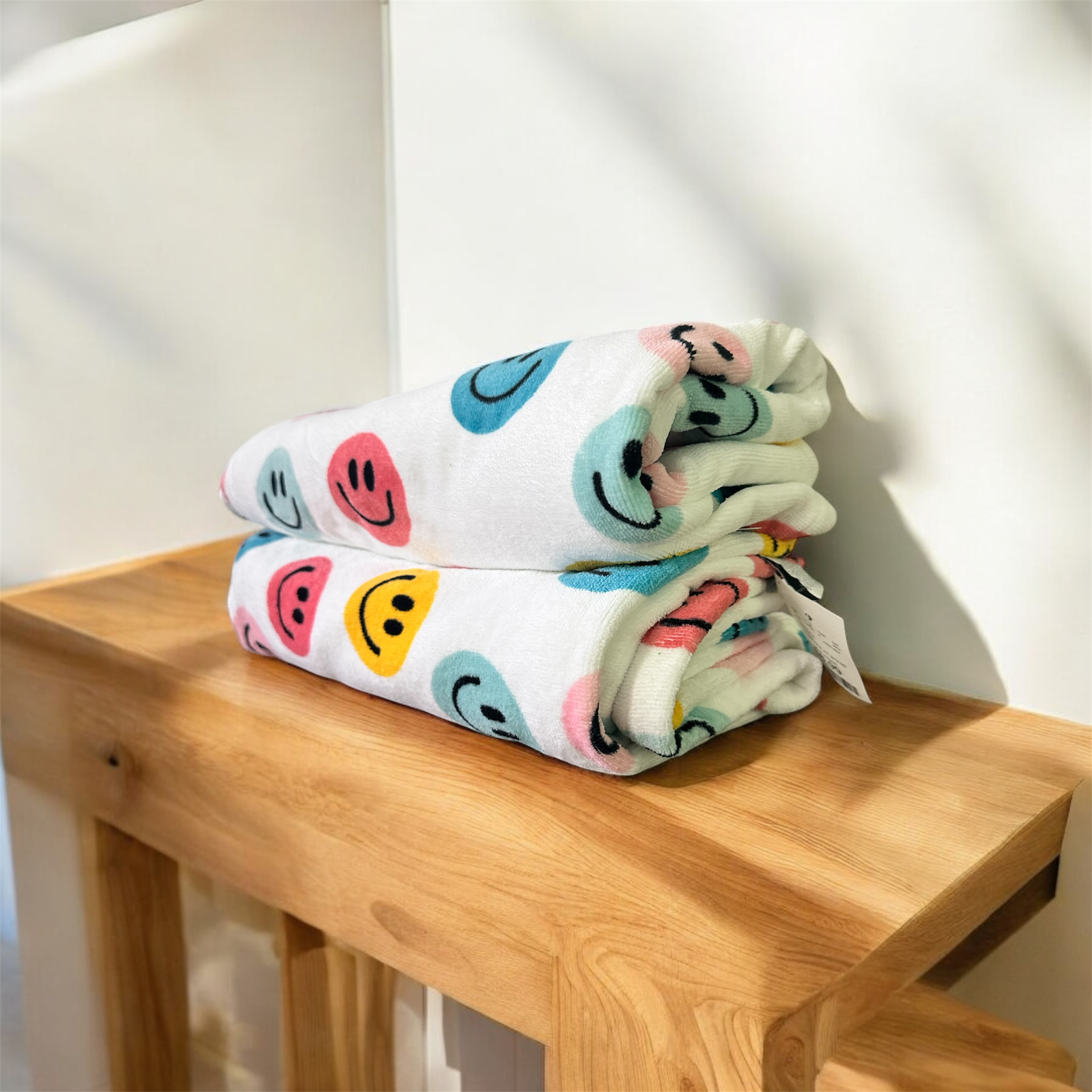 Toalla con estampado de Carita Feliz