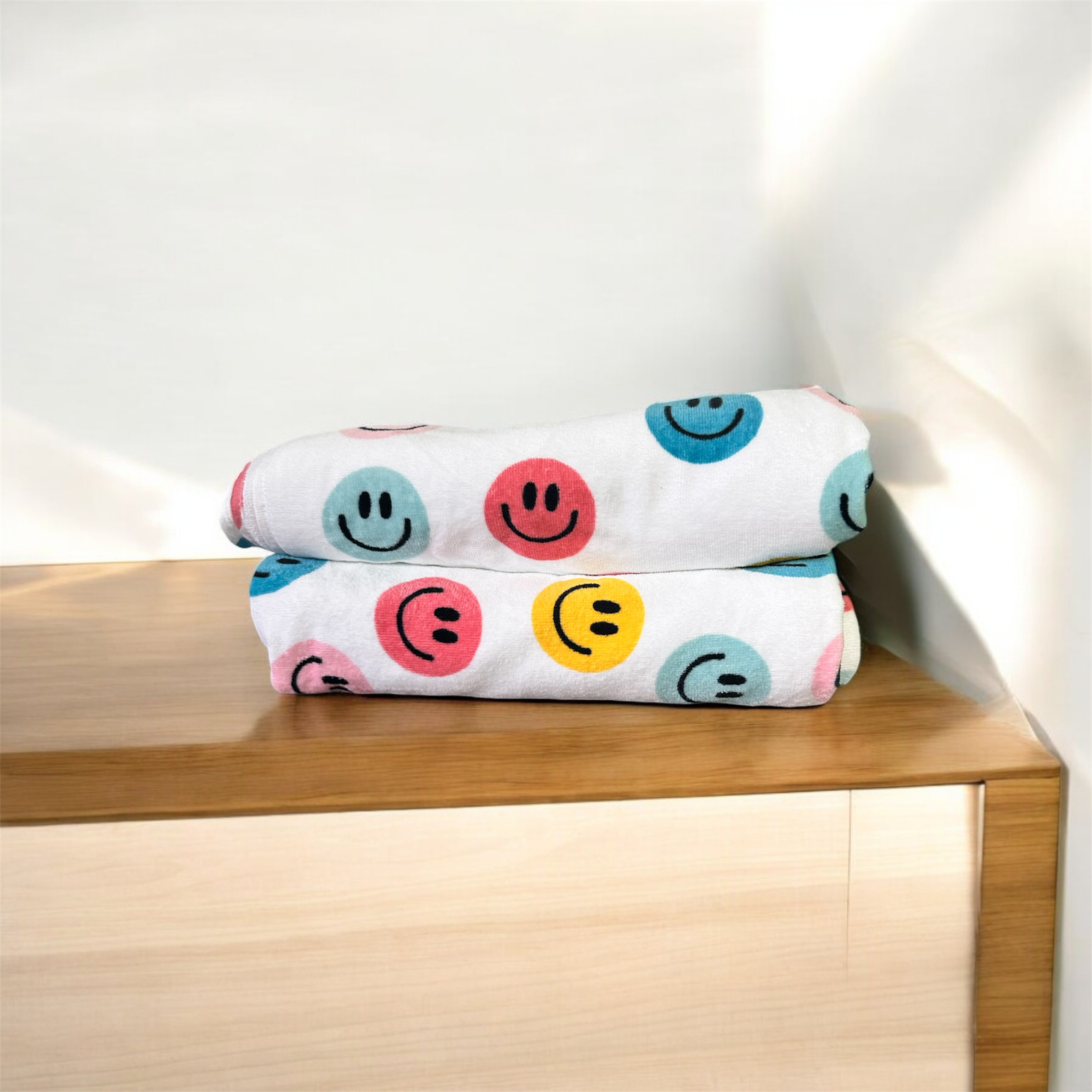 Toalla con estampado de Carita Feliz