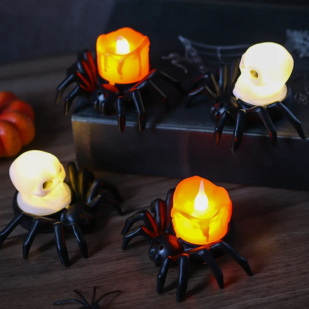 Araña porta velas de Calavera y Vela naranja