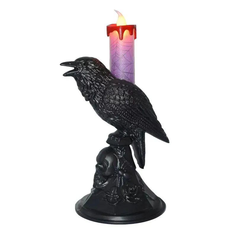 Candelabros de cuervo con velas decorativas