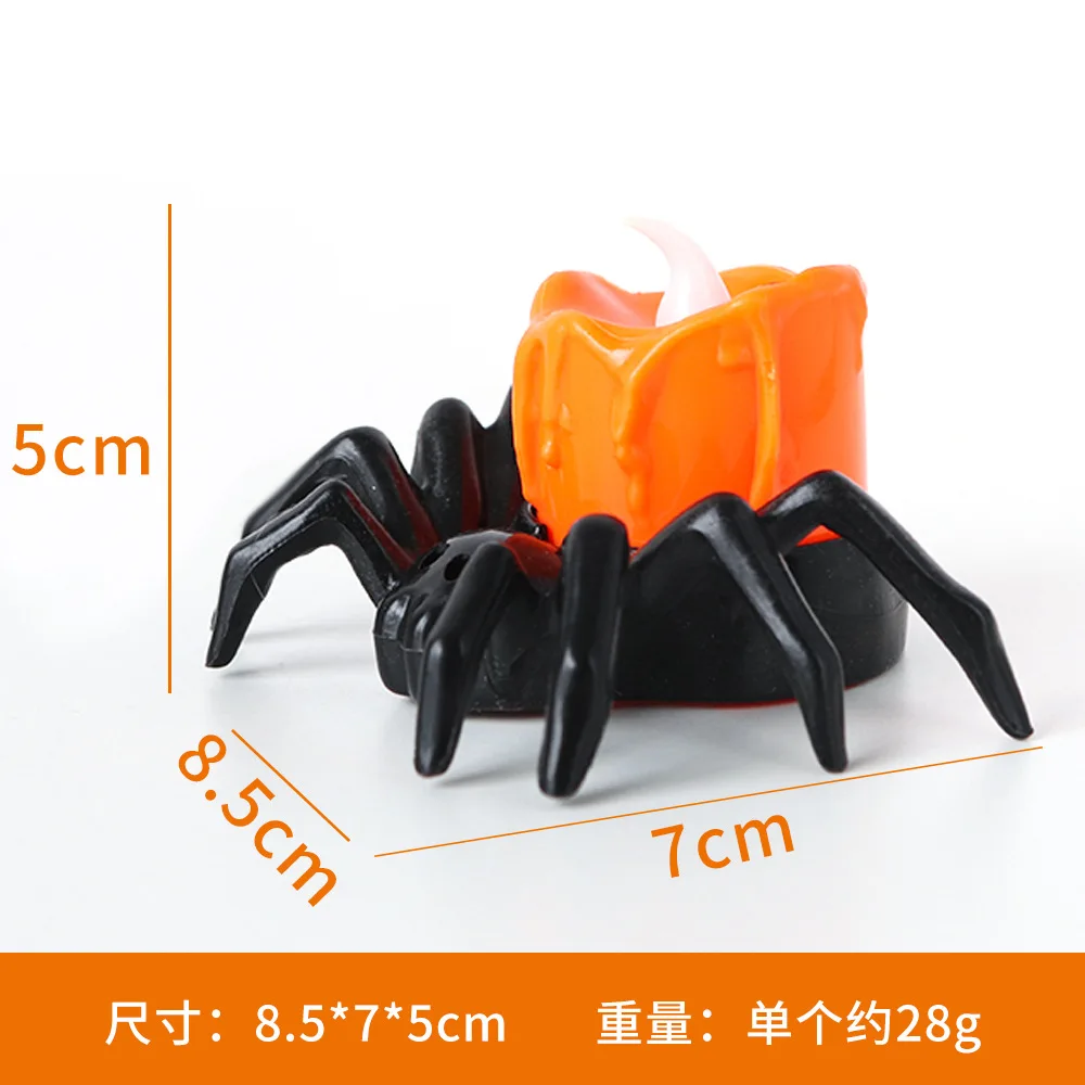 Araña porta velas de Calavera y Vela naranja