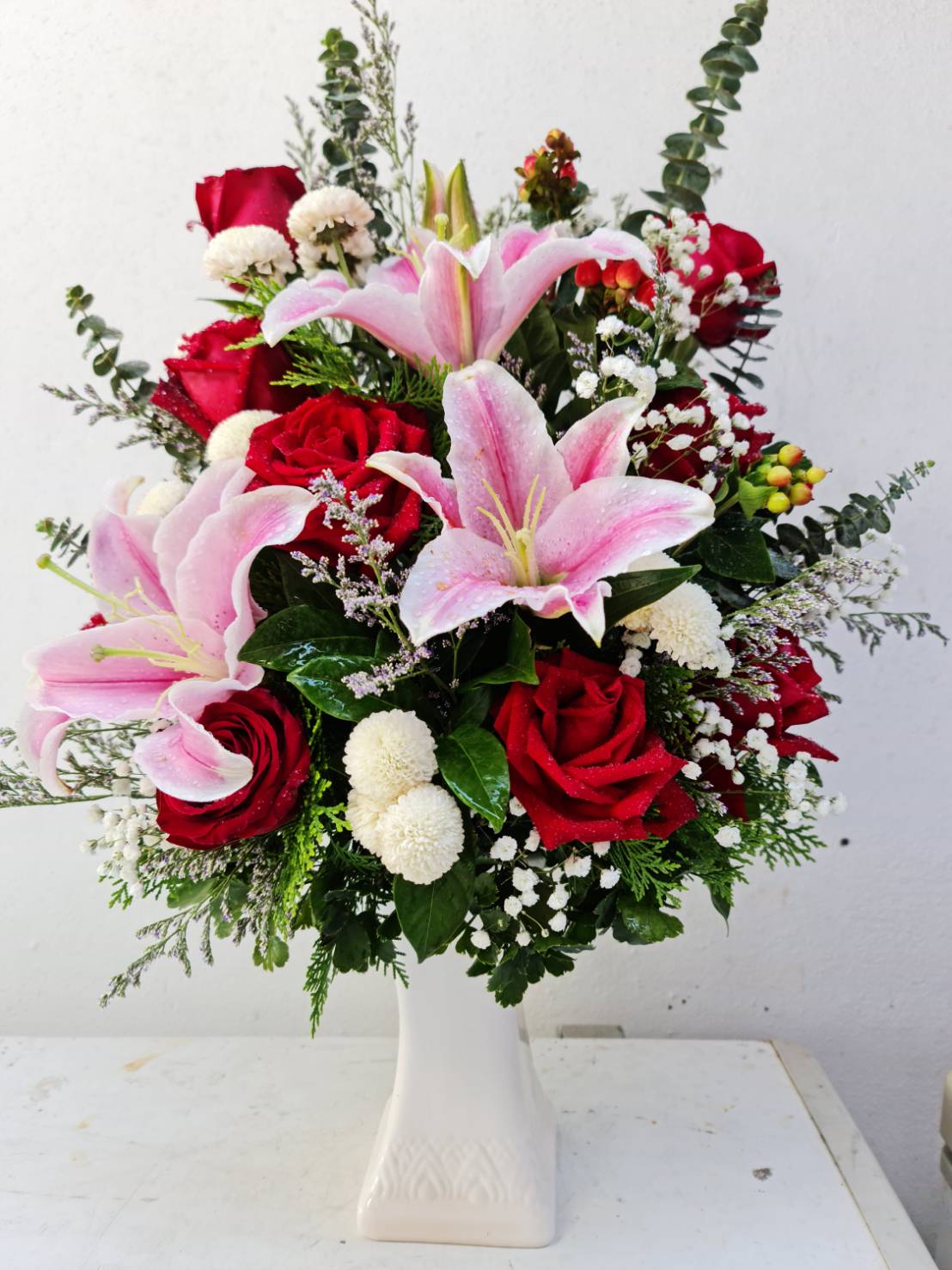 Floral Arrangement in White Vase