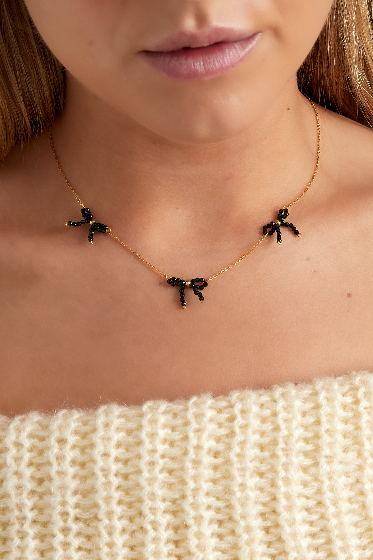 Beaded bows necklace 