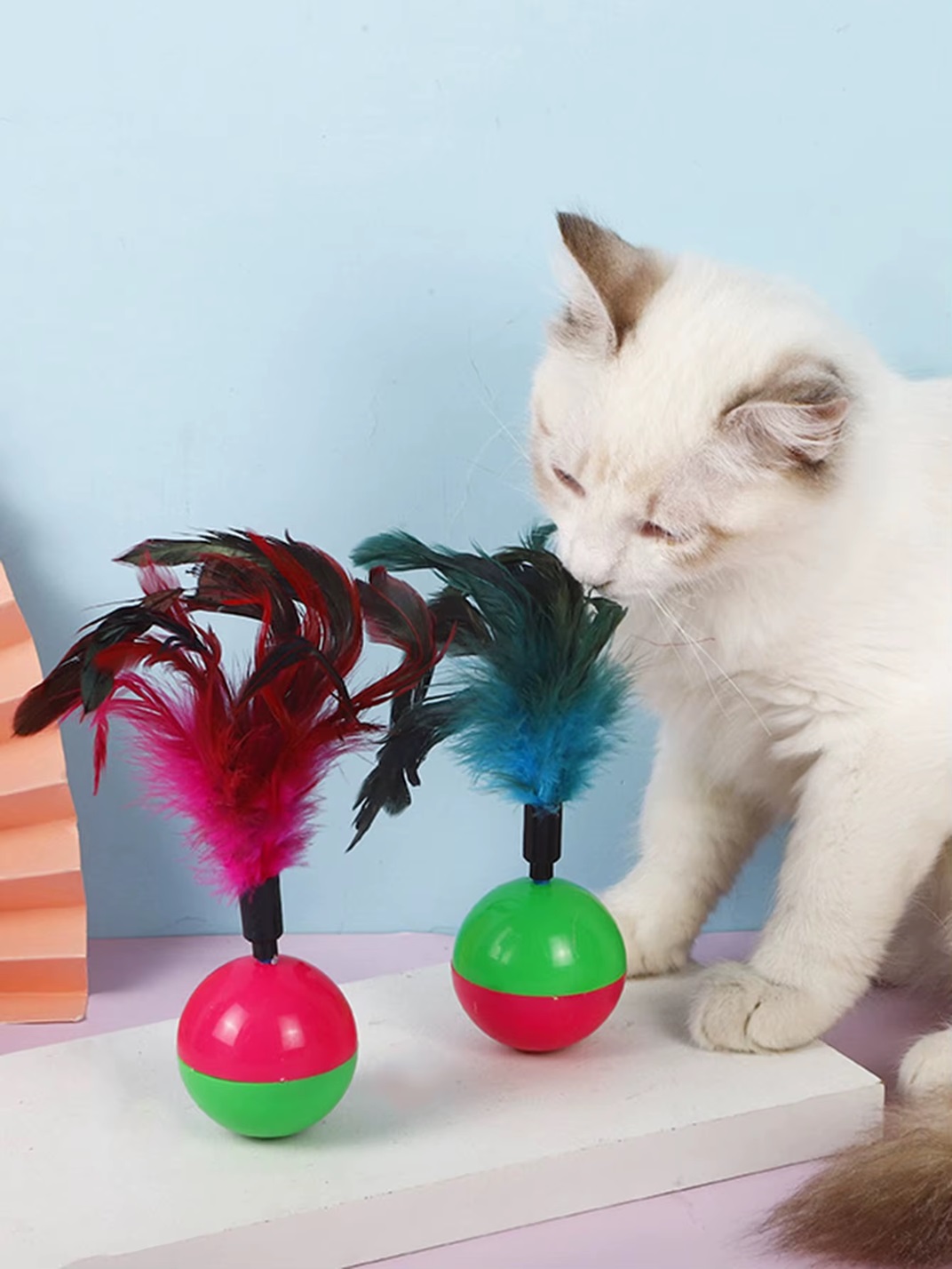 PLUMES sur boule à bascule