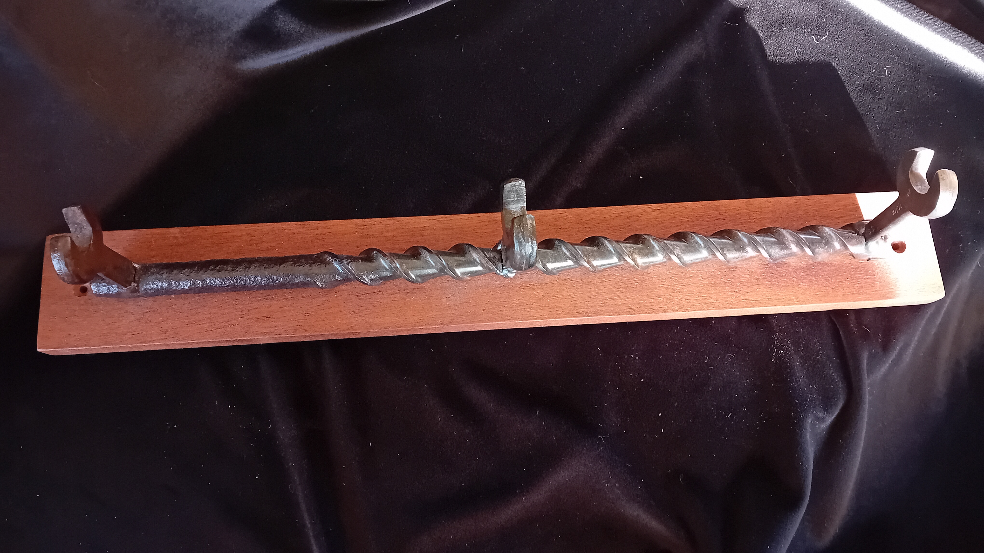 Drill bit and spanner coat hooks