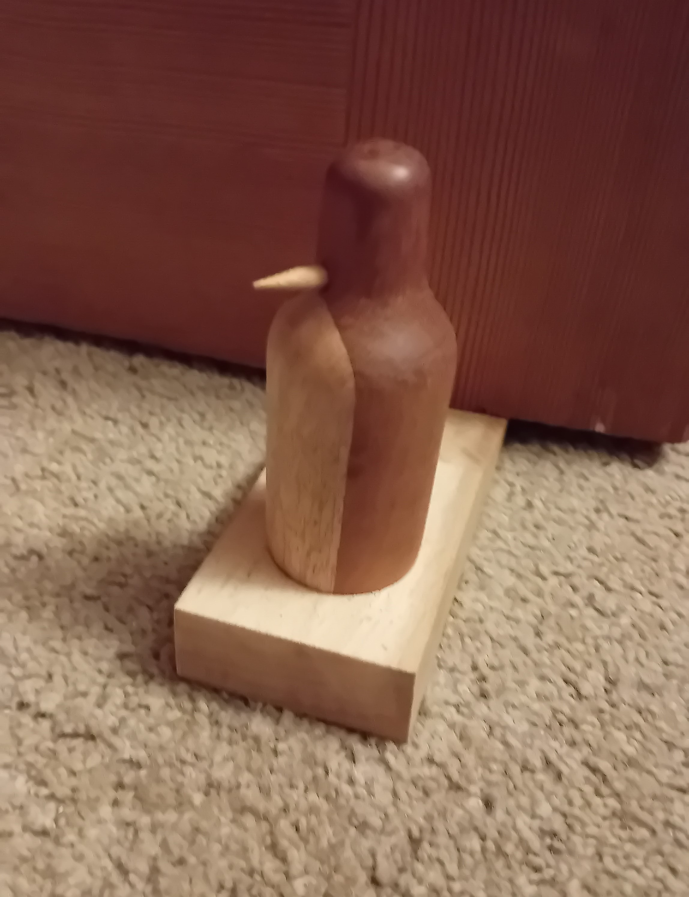 Cute wooden penguin doorstops