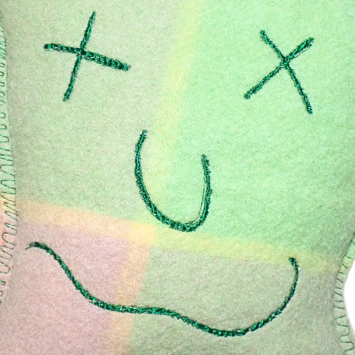 Cuddle Monster, multi-coloured medium with green fluffy hair