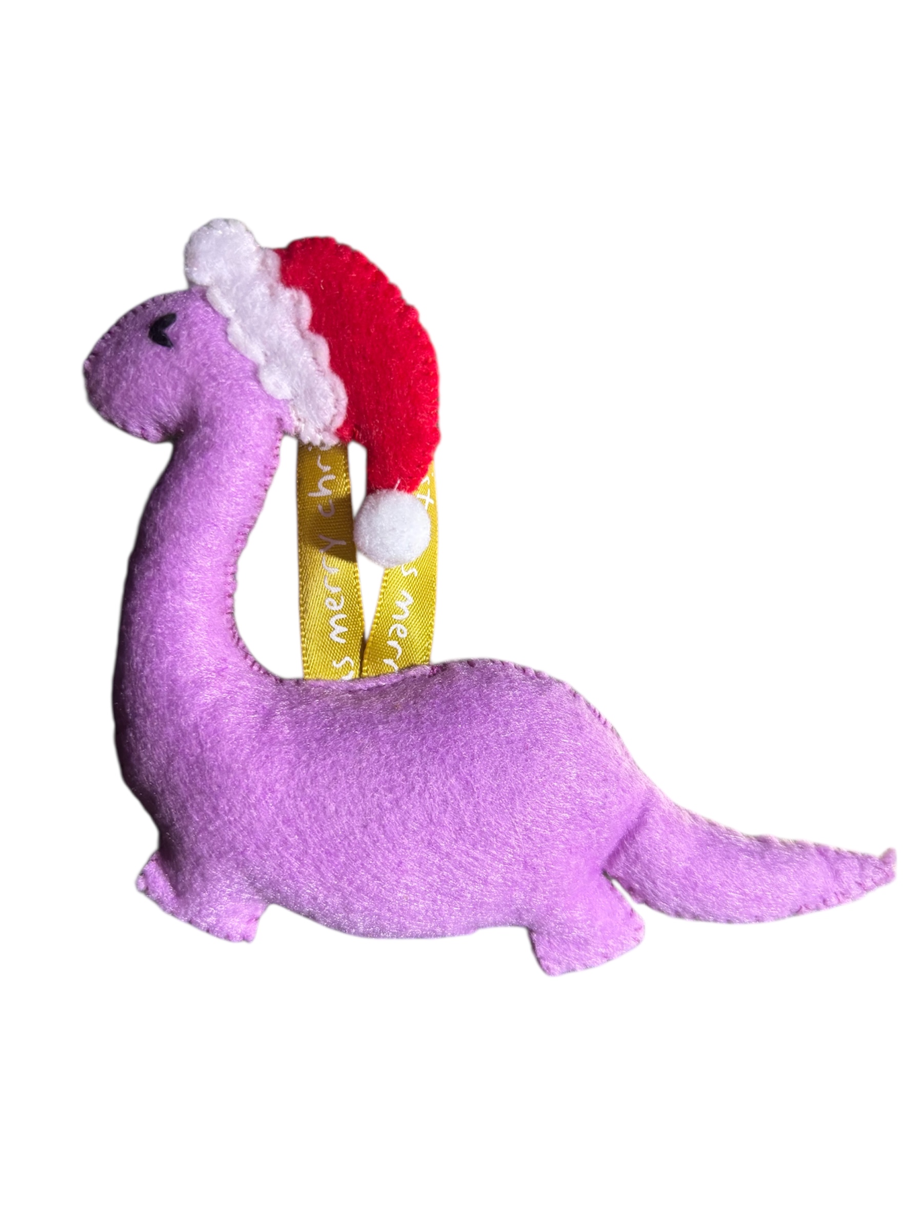 Handmade felt Christmas Dinosaur with Santa hat on.