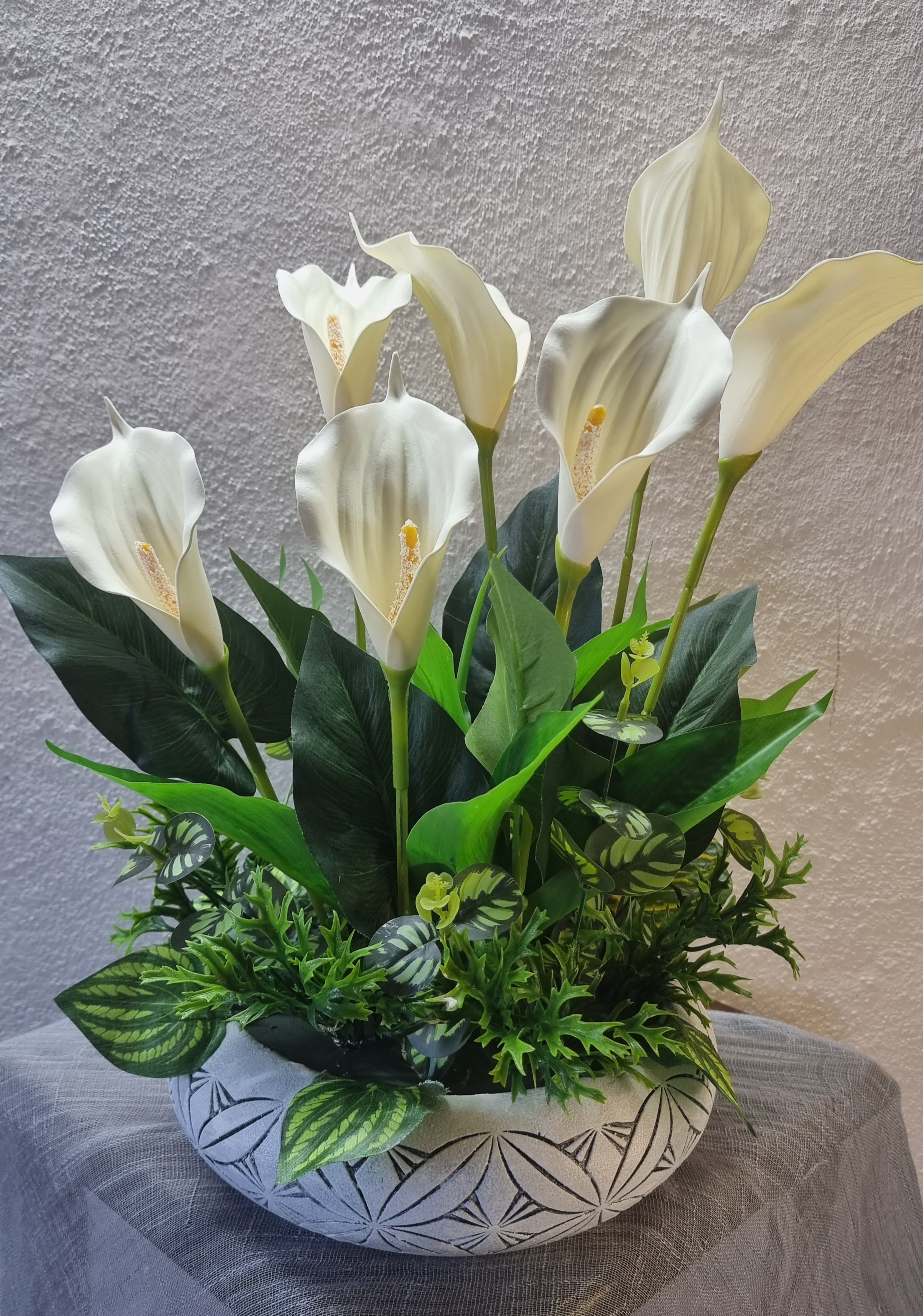 Planter with artificial calla lilies