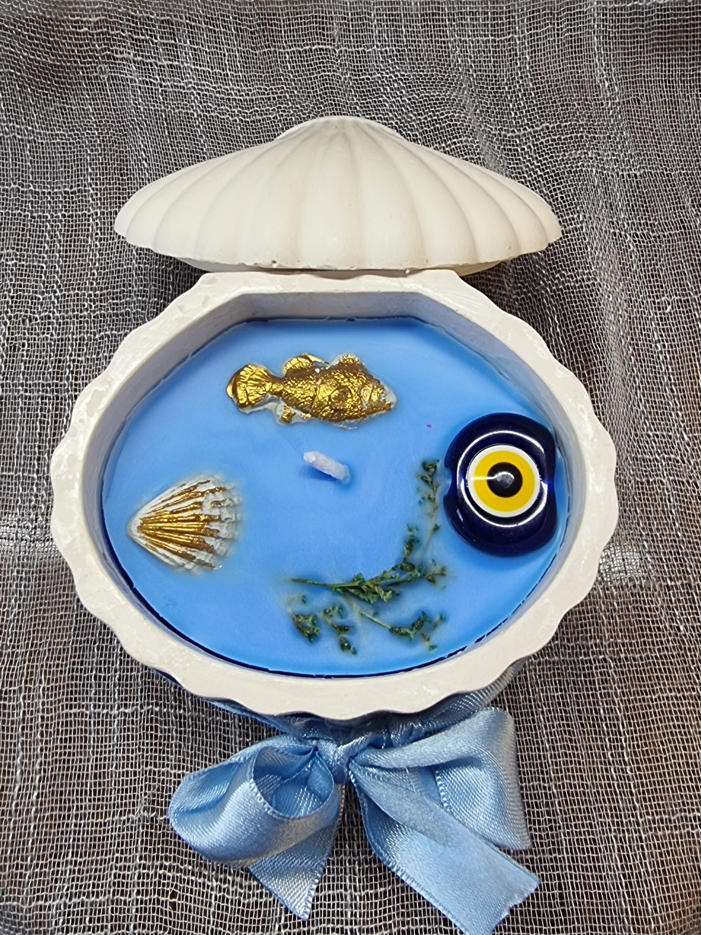 Blue wax in a handmade seashell (fresh linen scented)