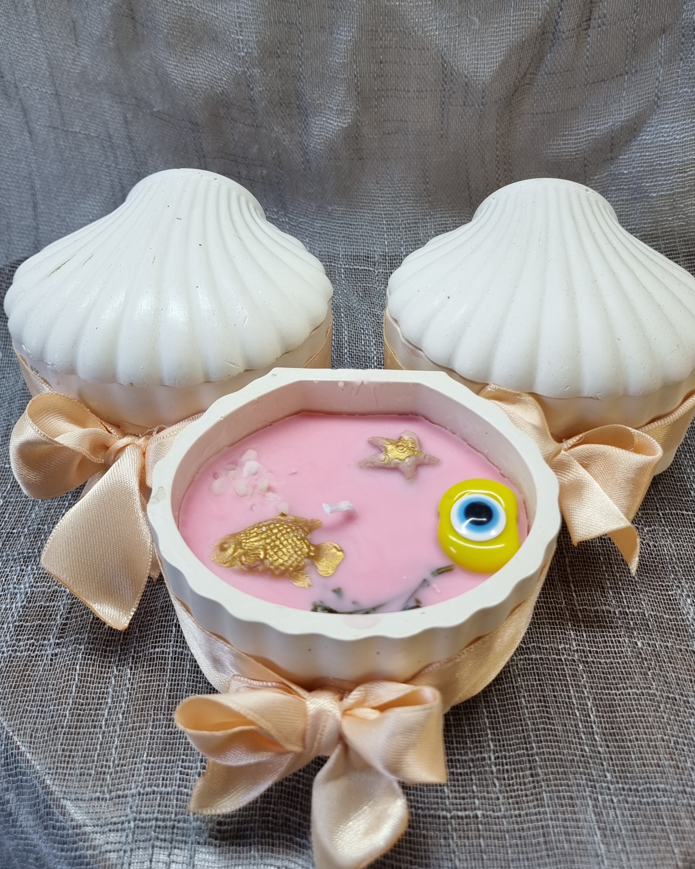 Pink wax in a handmade seashell (rose scented)