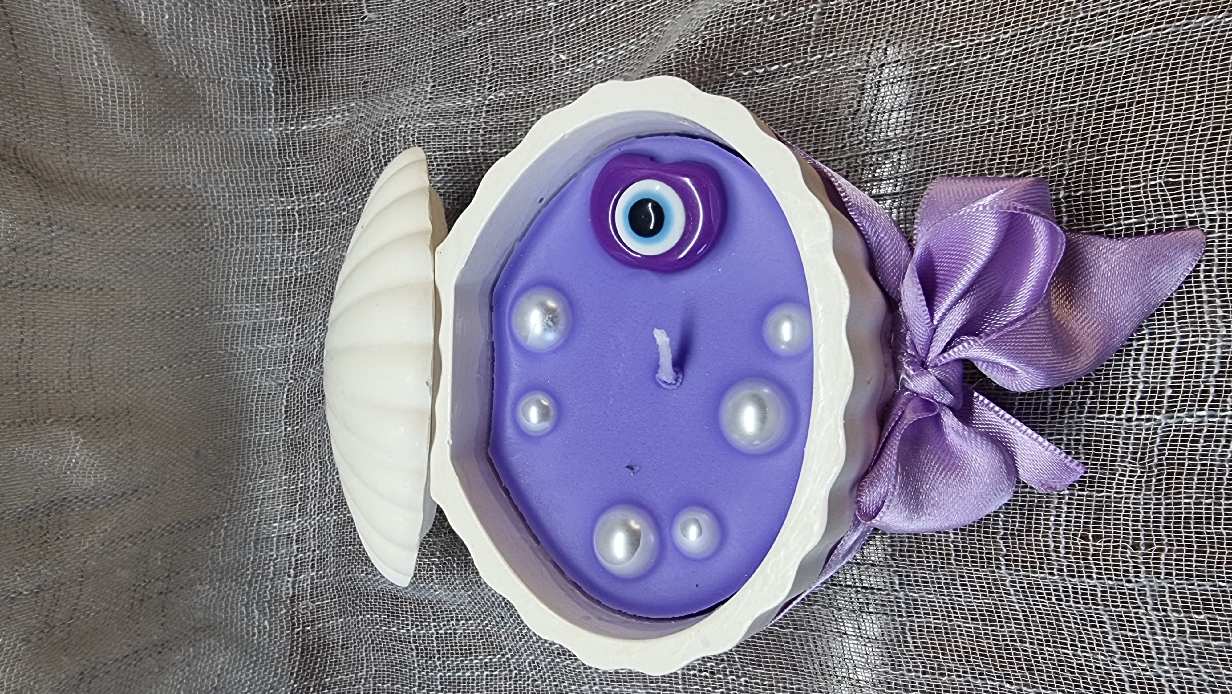 Purple wax in a handmade seashell (lavender scented)