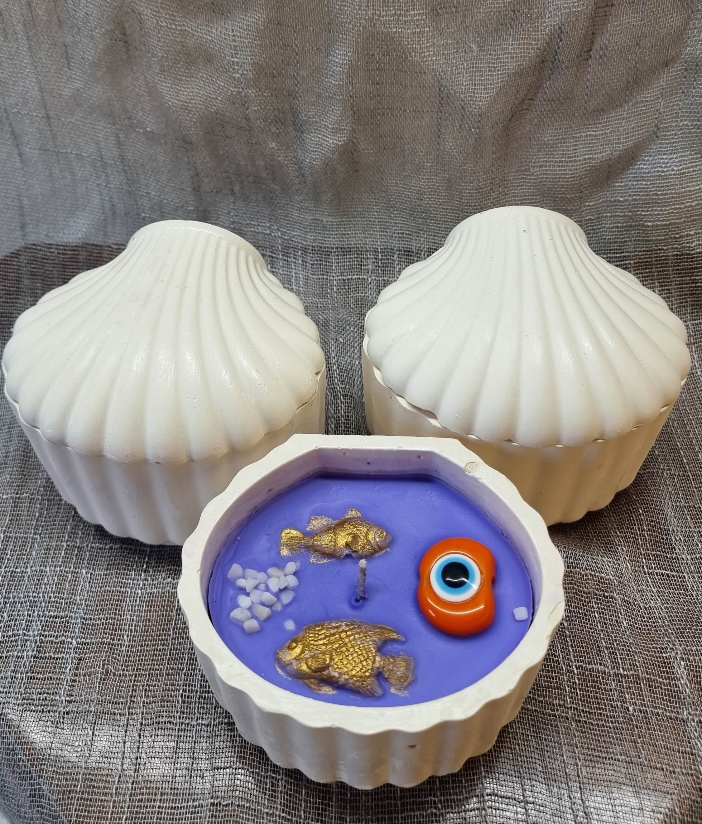 Purple wax in a handmade seashell (violet scented)