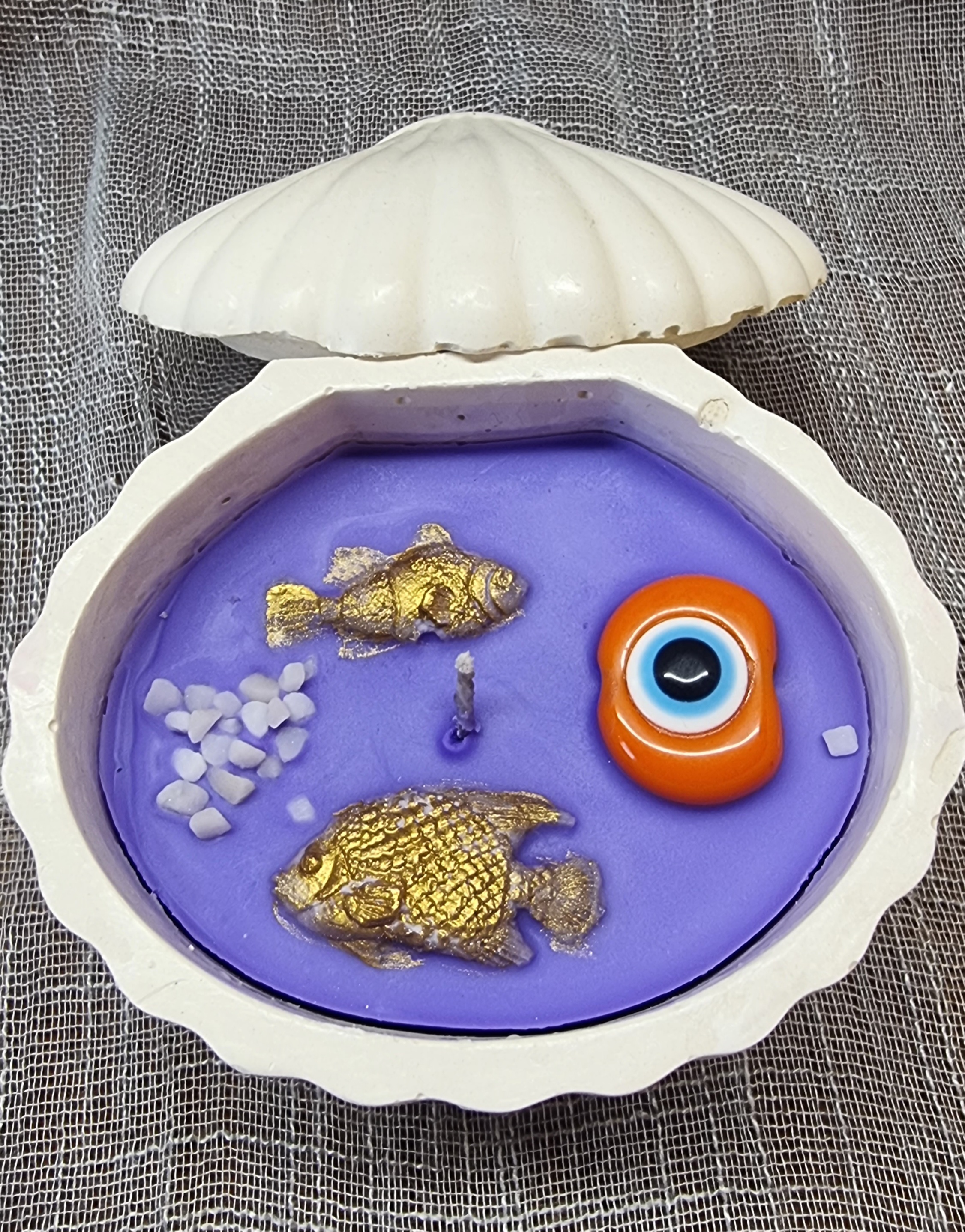 Purple wax in a handmade seashell (violet scented)