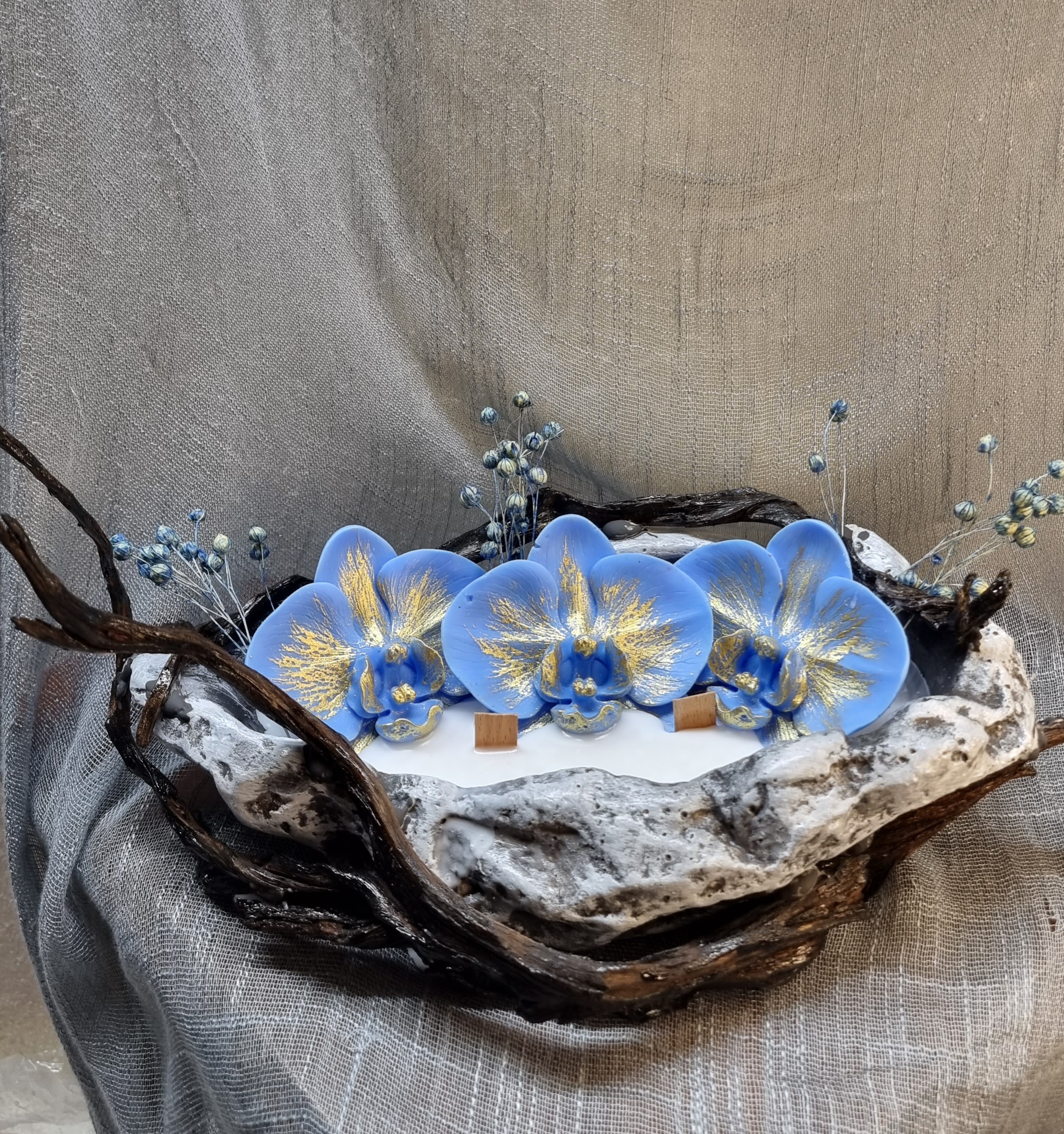 King-size candle with blue wax orchids