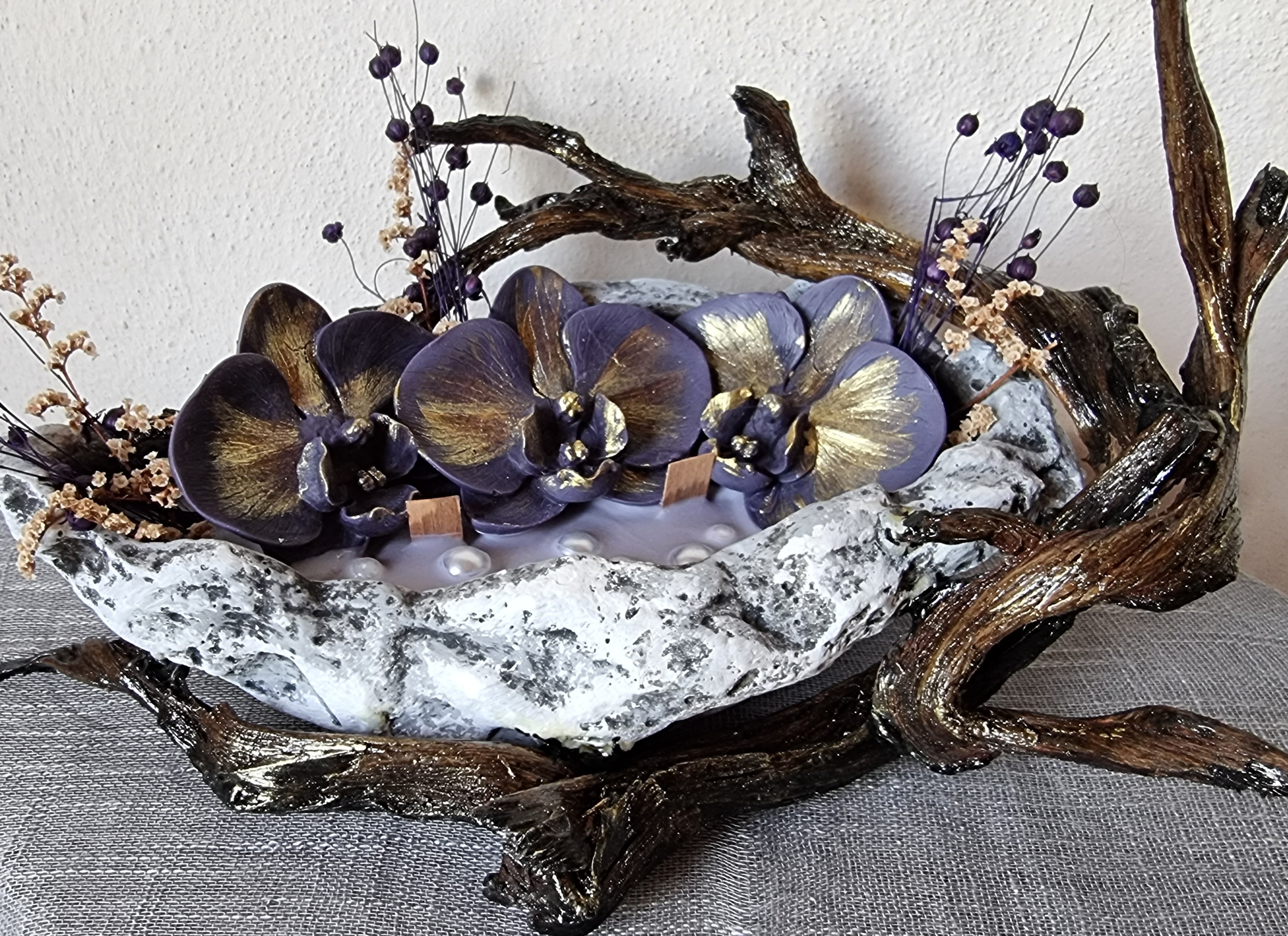 King-size candle with black wax orchids