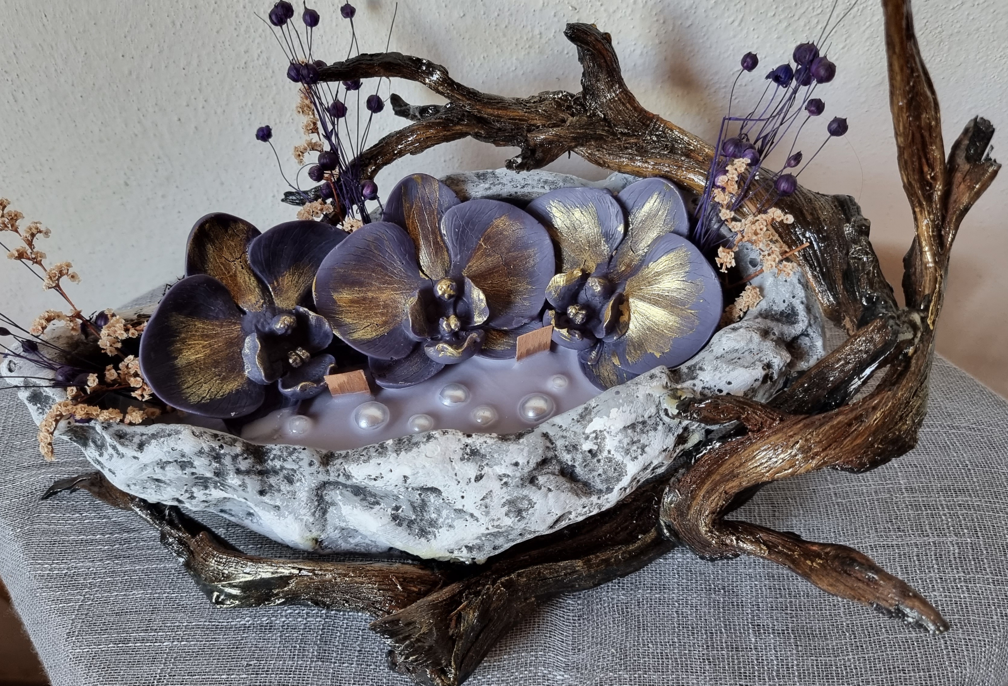 King-size candle with black wax orchids 