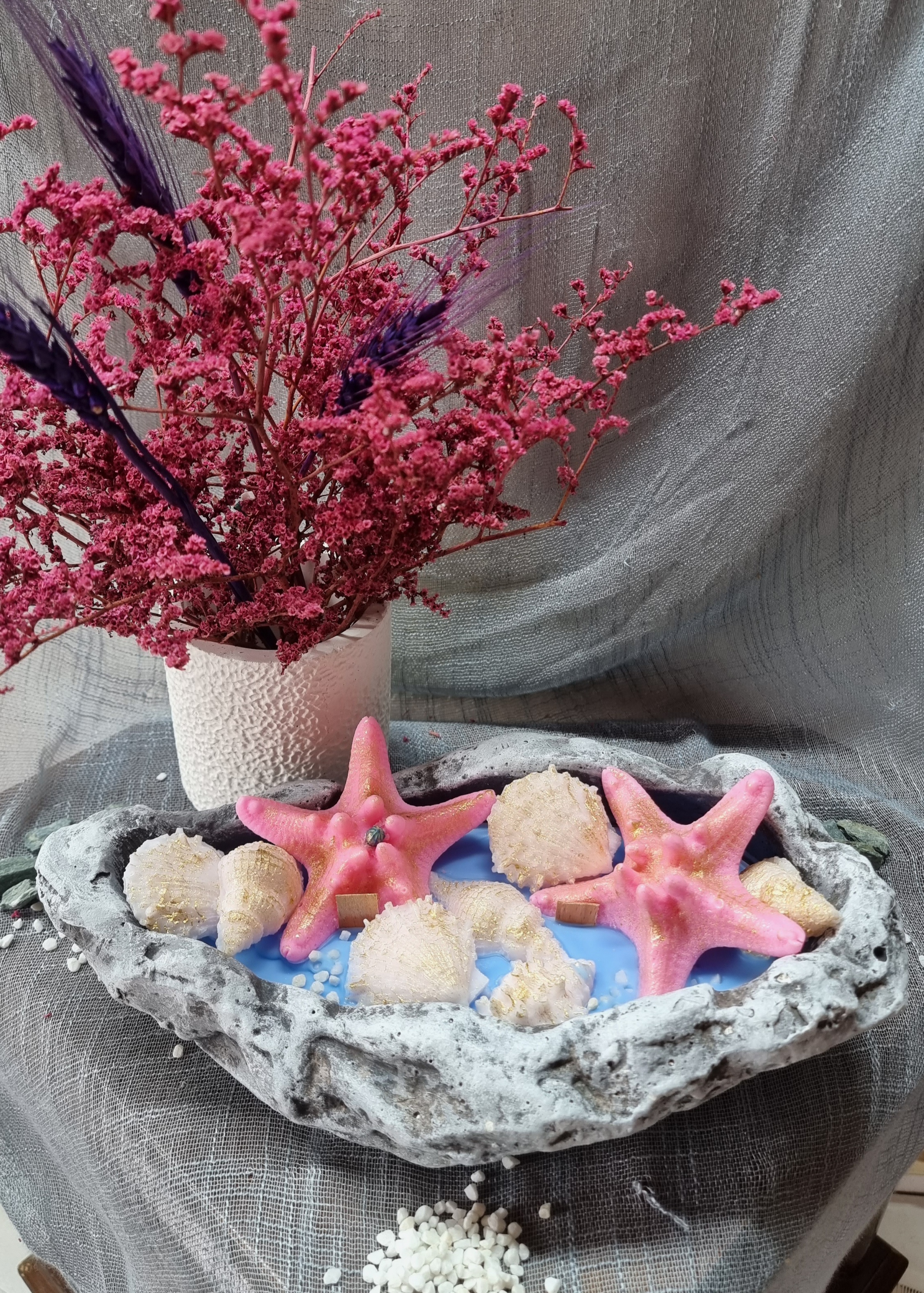 King-size candle with wax starfishes and wax seashells