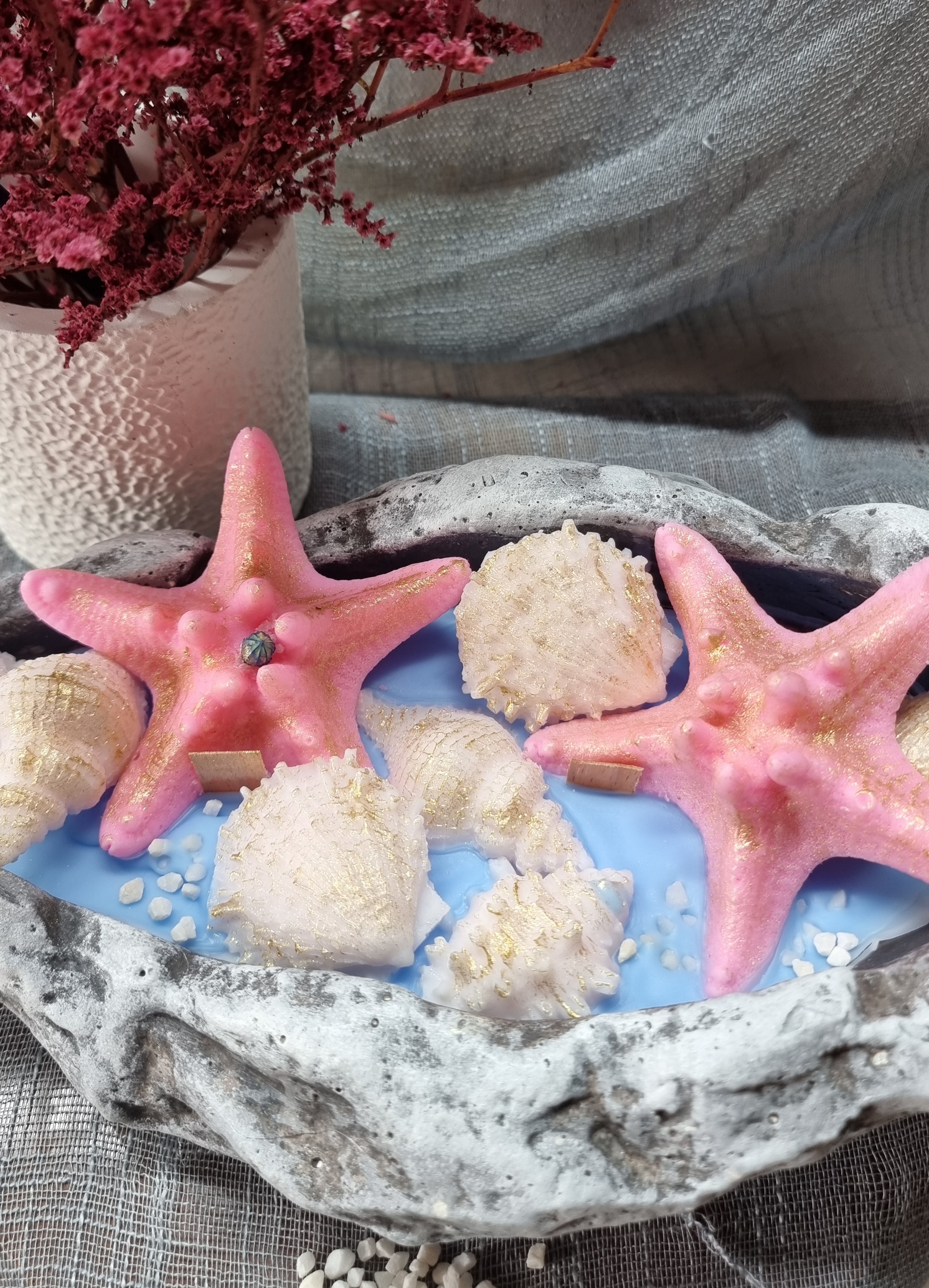 King-size candle with wax starfishes and wax seashells 