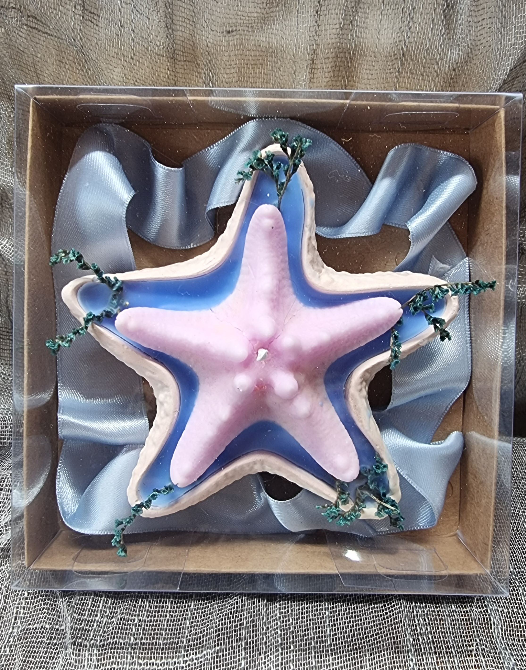 Pink starfish candle in a gift box (strawberry scented)
