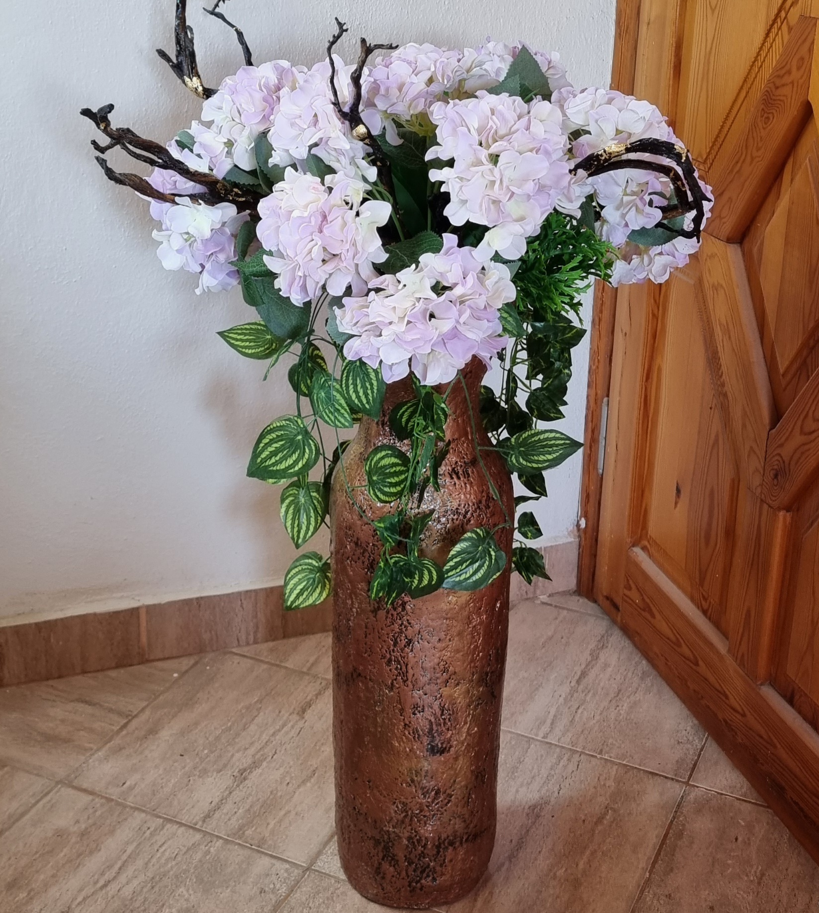 King-size vase with artificial flowers