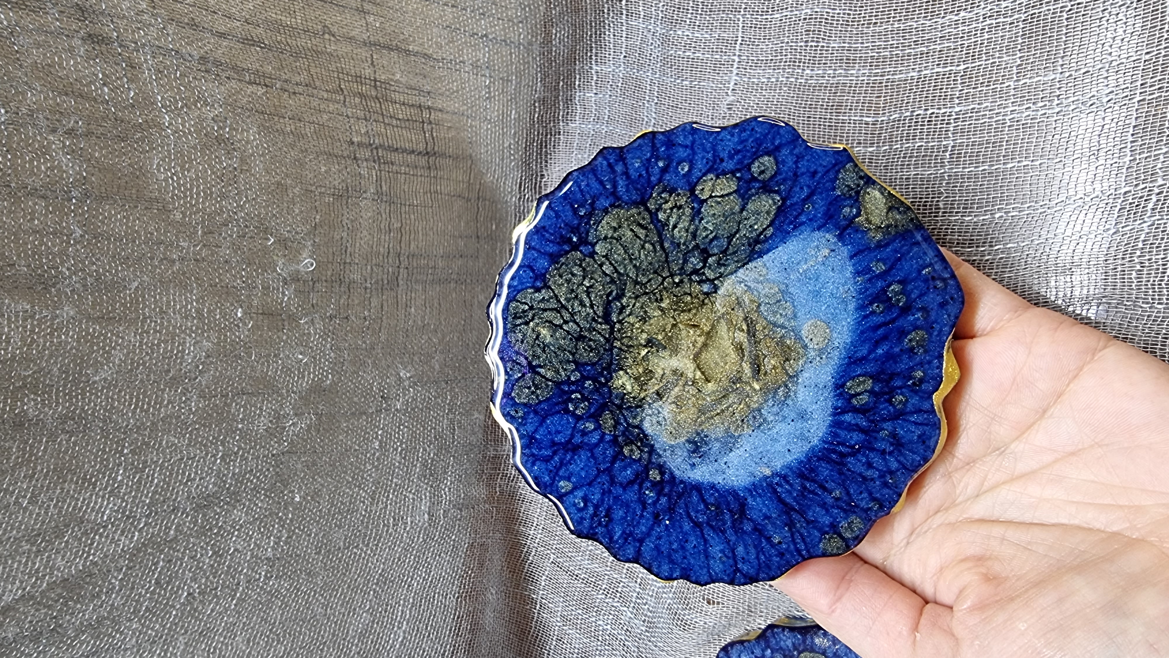 Set of 2 epoxy-resin coated coasters for wine glasses or tea cups