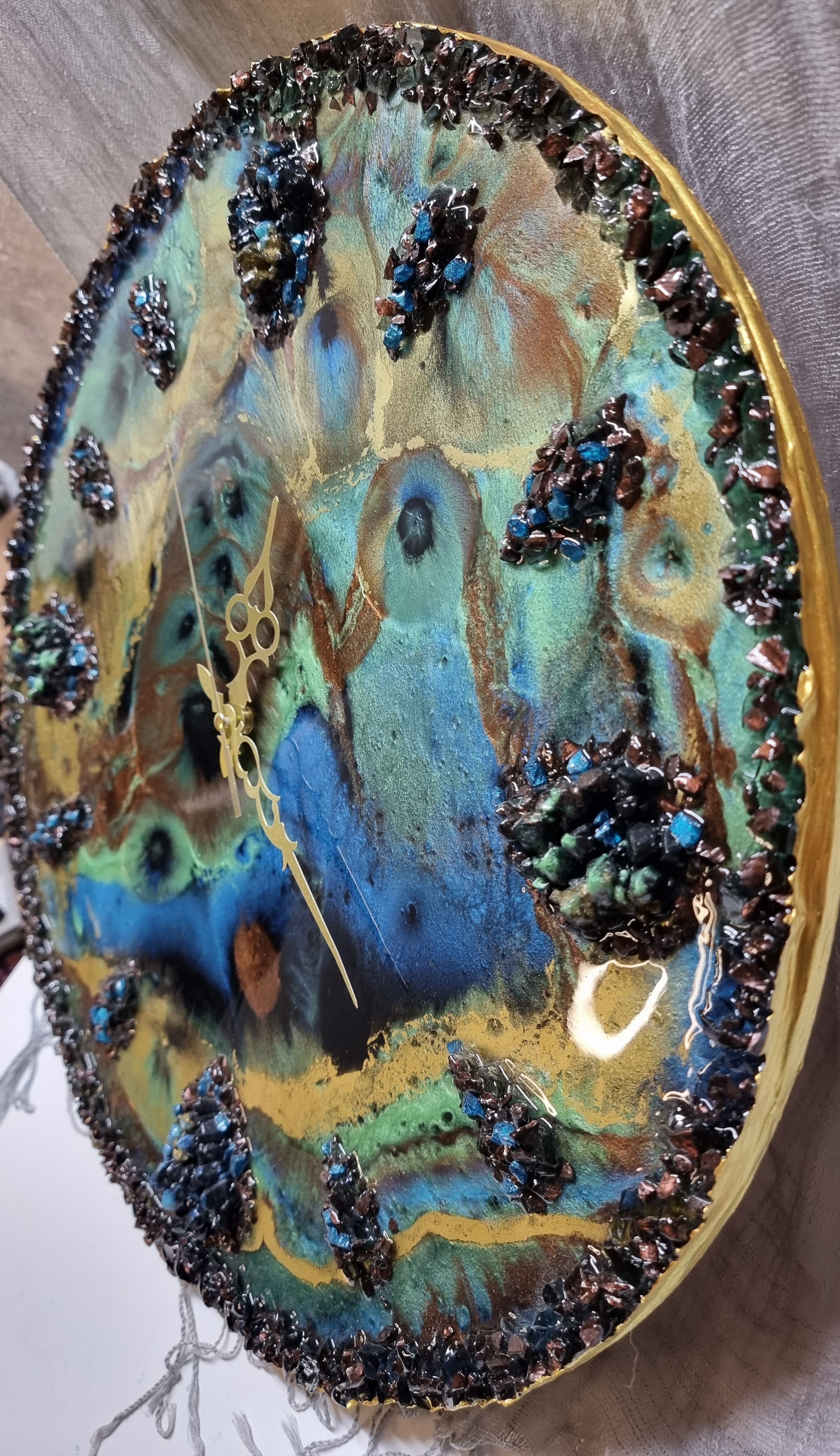 Designer-made one-of-a-kind epoxy-resin coated multi-colored wall clock. Diameter: 50 cm.