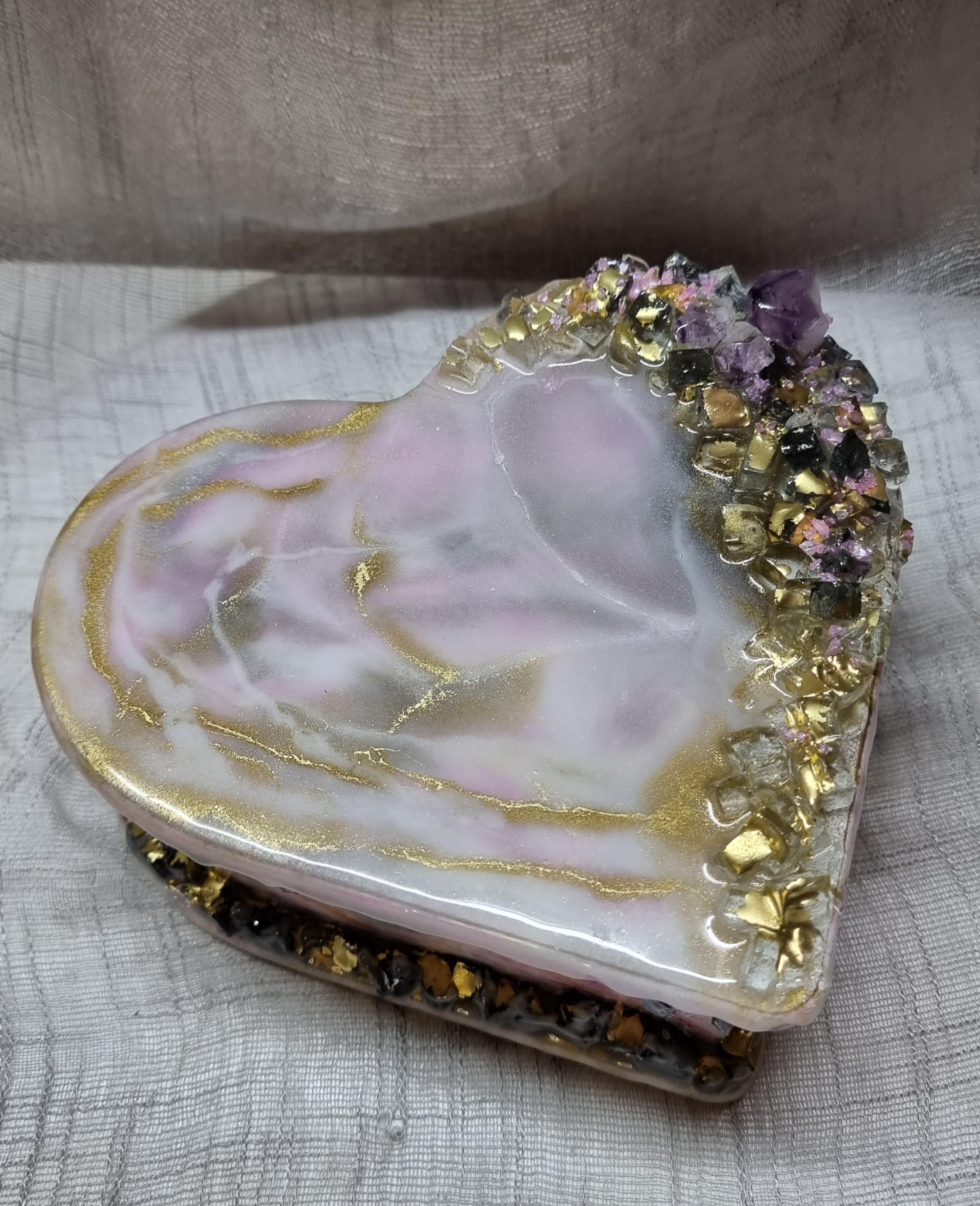 Heart-shaped pink-coloured epoxy-resin coated jewellery box adorned with natural amethysts