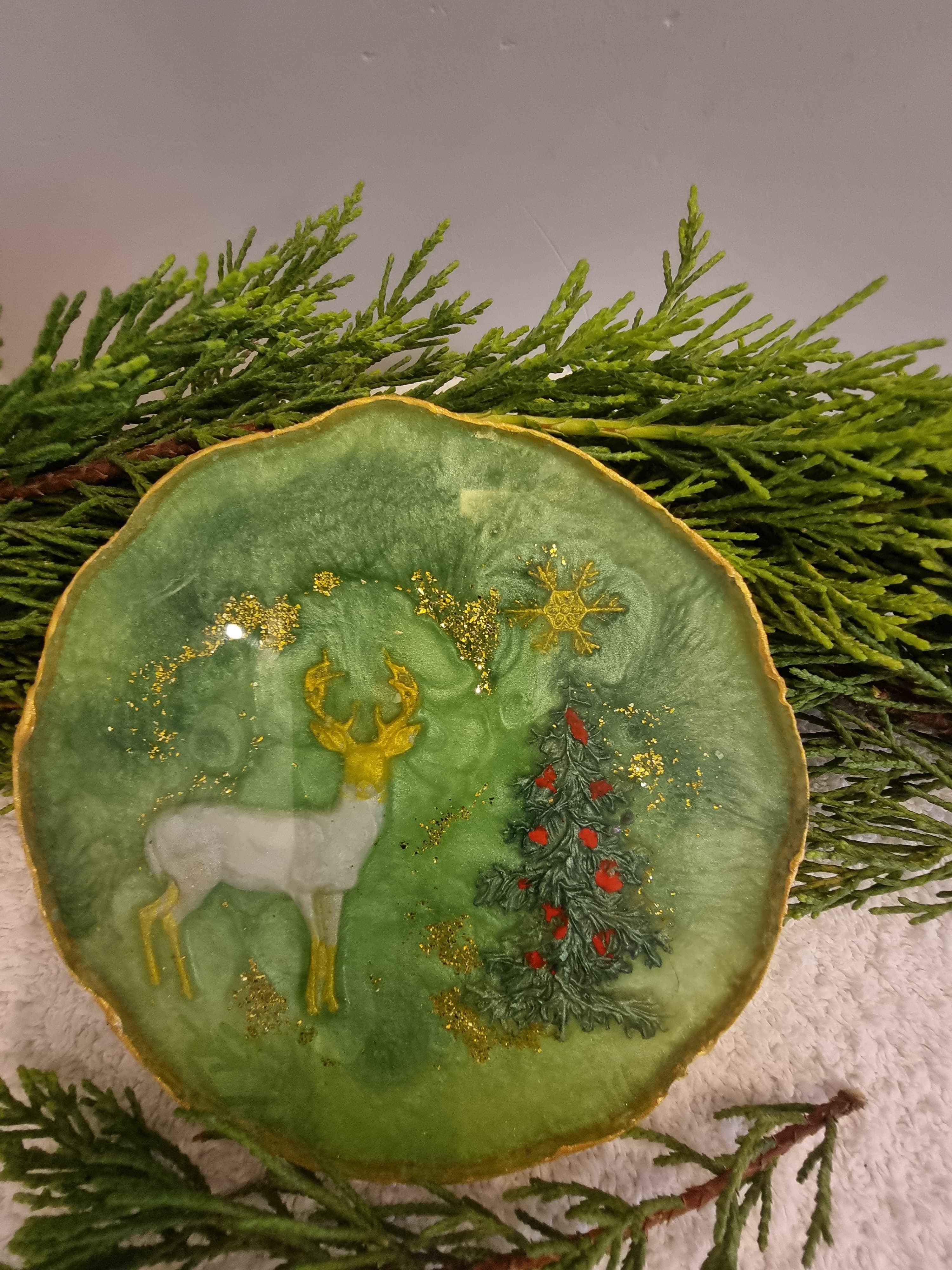 Epoxy-resin coasters Christmas themed (featuring a deer and a Christmas tree)