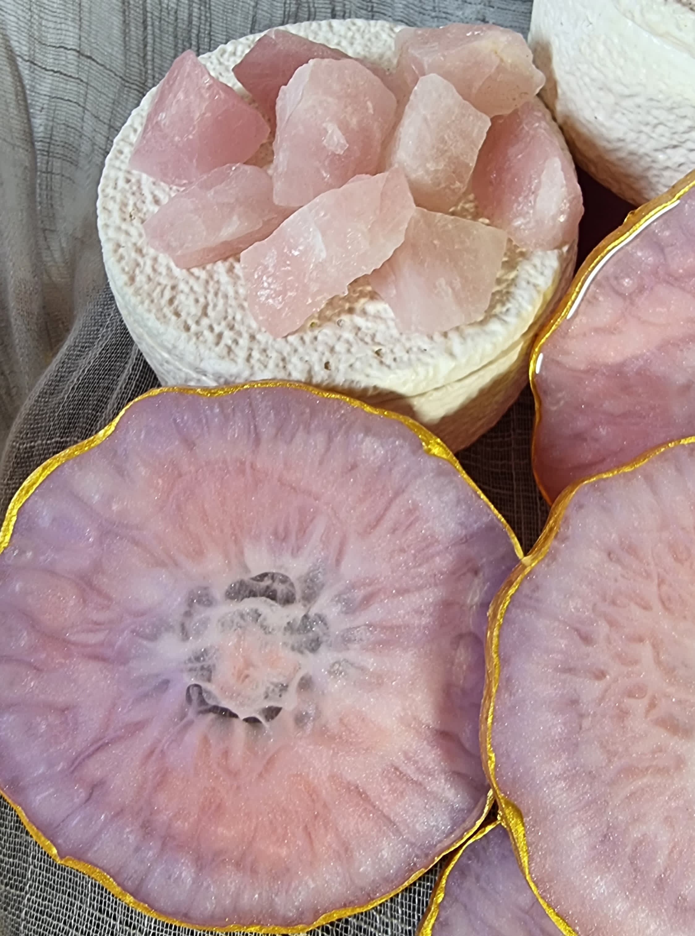 Epoxy-resin coasters in pale pink colour 