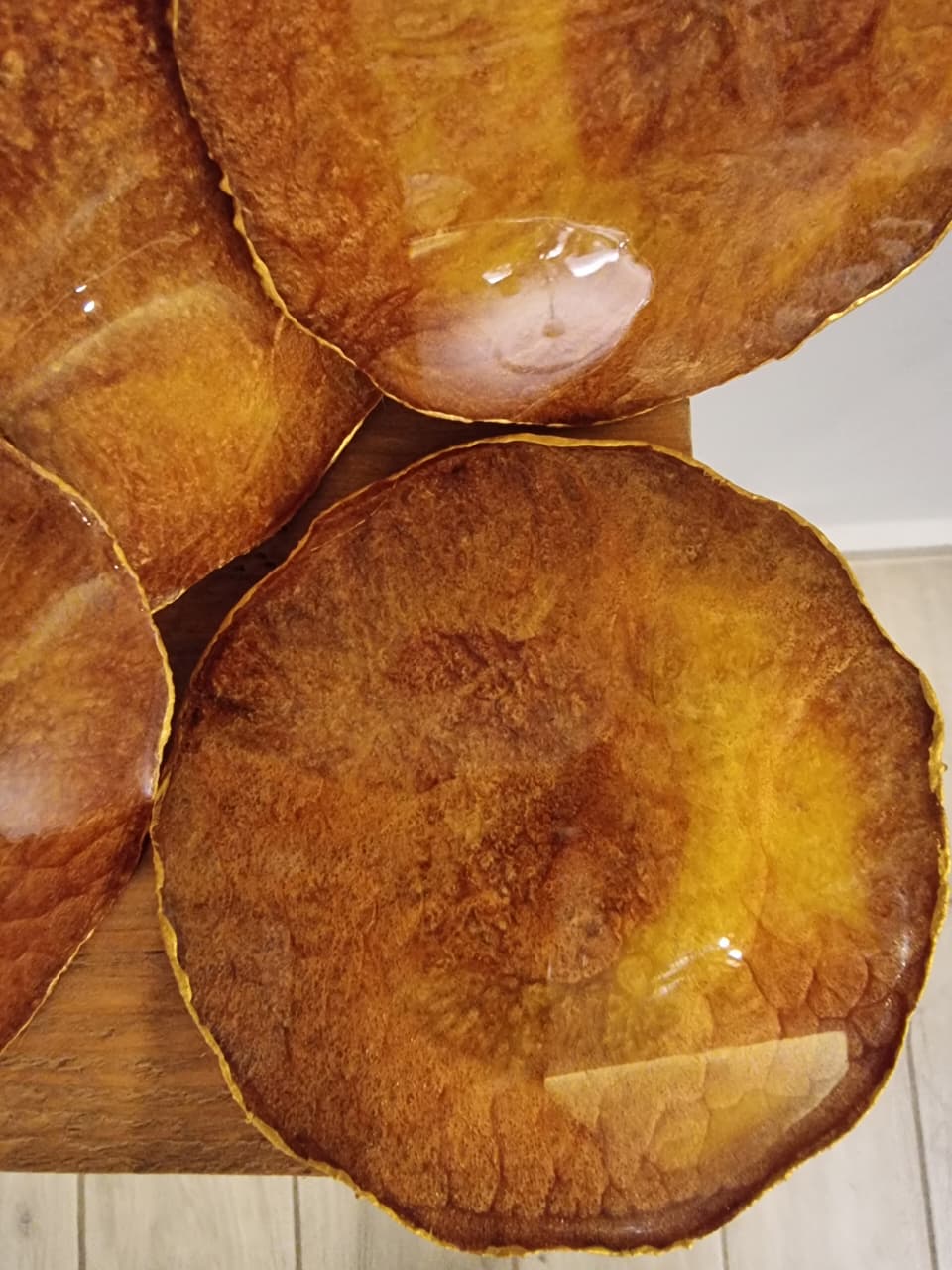 Epoxy-resin coasters in brown-and-yellow colour 