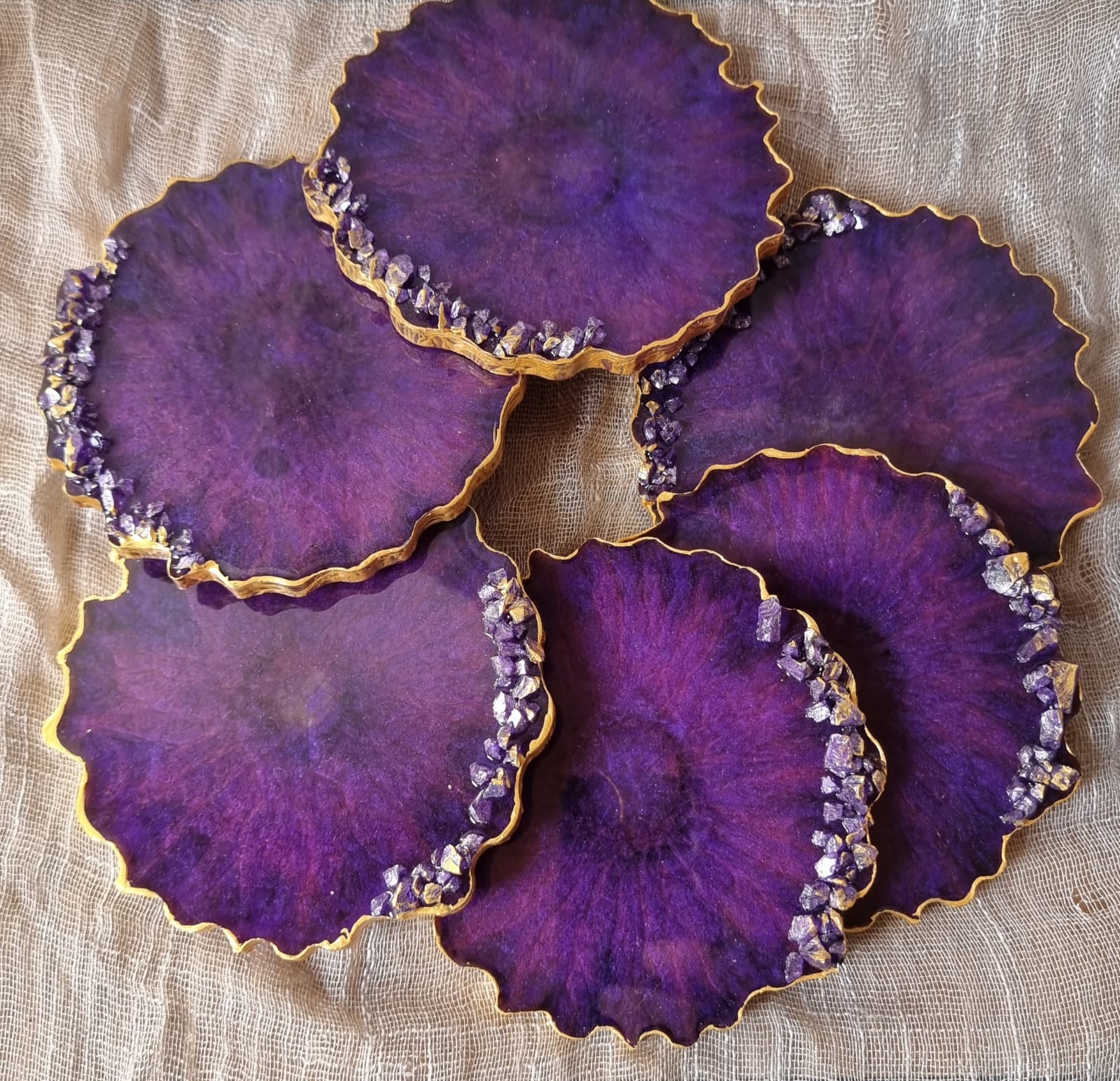 Epoxy-resin coasters in deep purple colour 