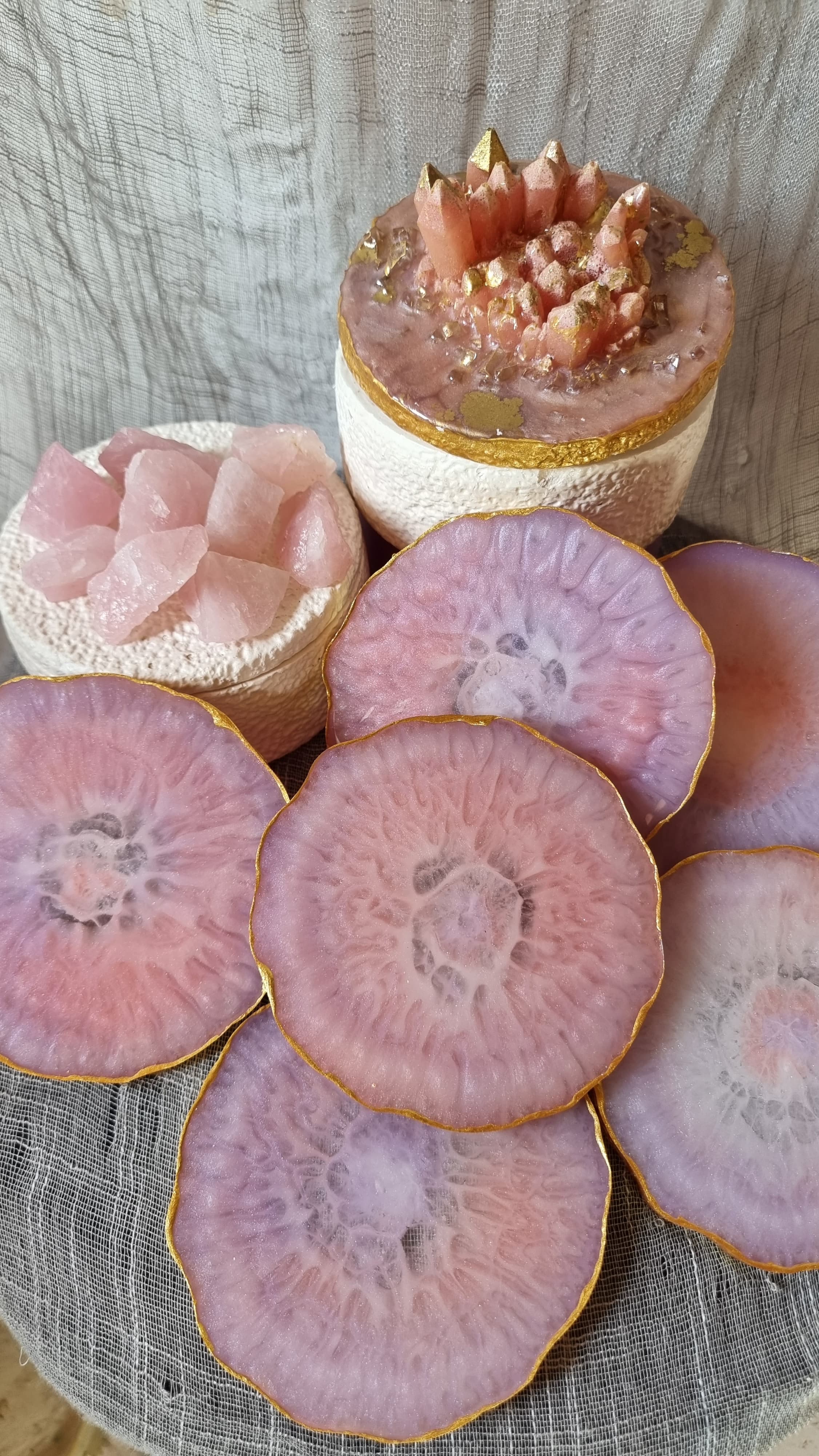 Epoxy-resin coasters in pale pink colour 