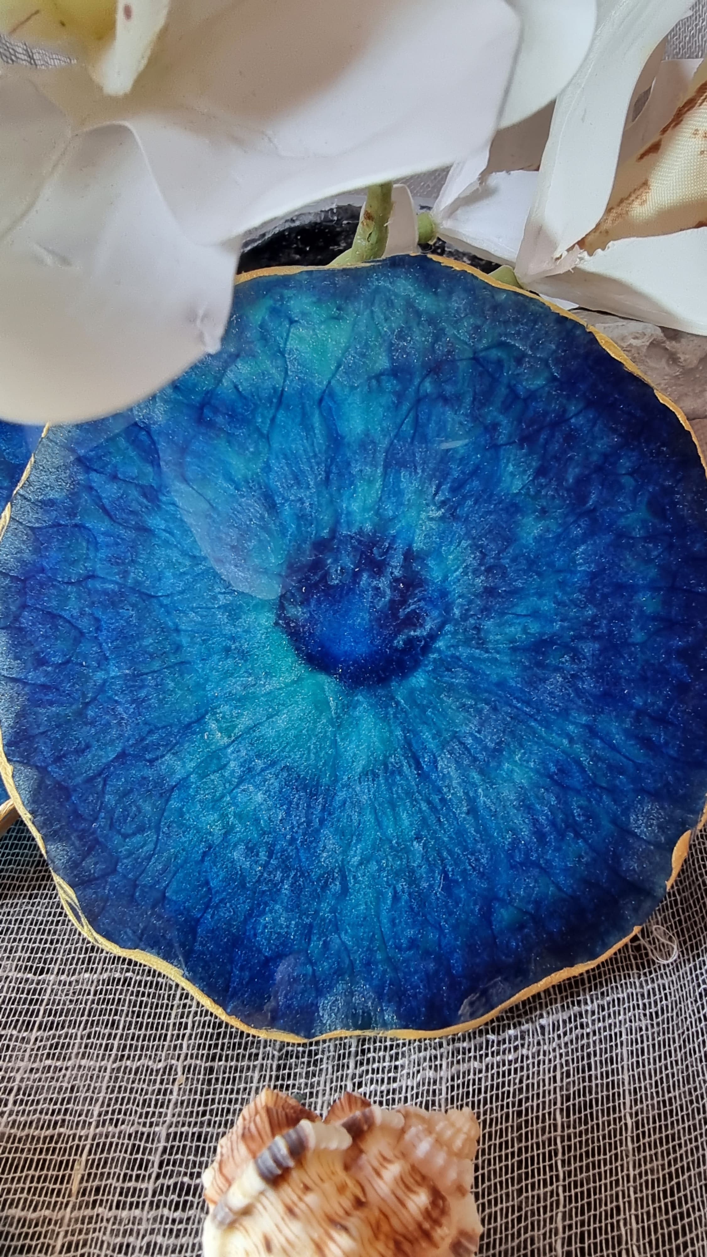 Epoxy-resin coasters in deep blue colour 