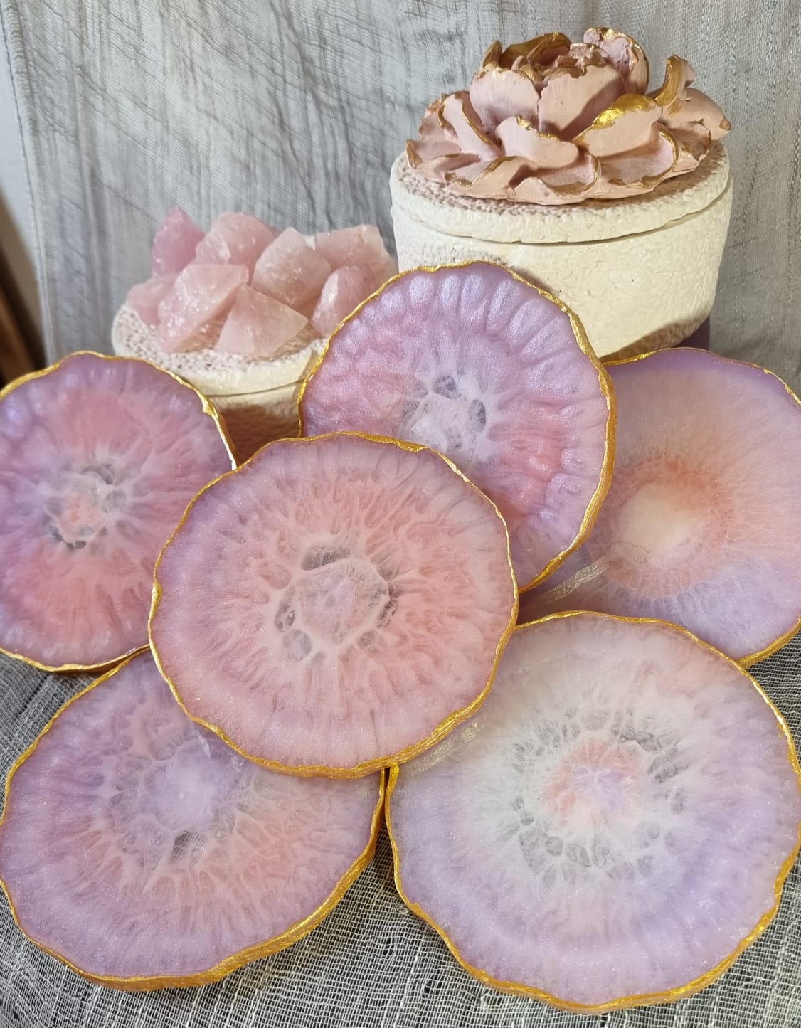 Epoxy-resin coasters in pale pink colour 