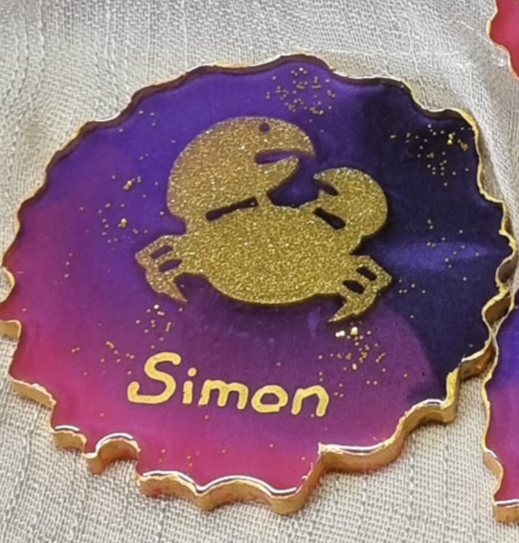 Personalised epoxy-resin coasters featuring Zodiac signs (star signs)