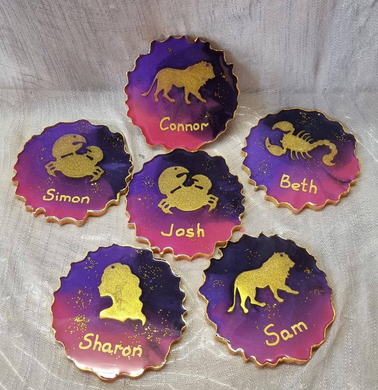 Personalised epoxy-resin coasters featuring Zodiac signs (star signs)