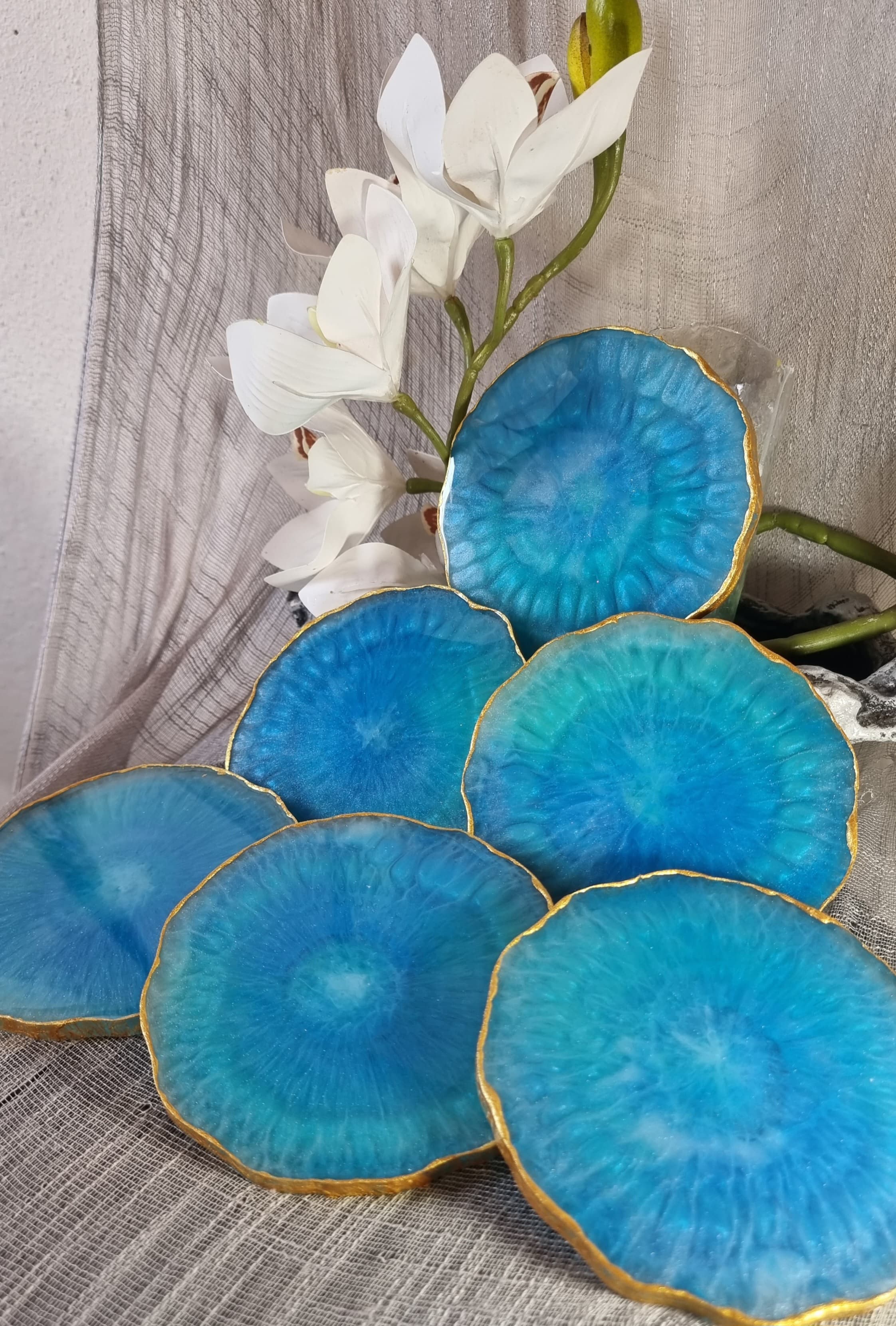 Epoxy-resin coasters in blue colour 