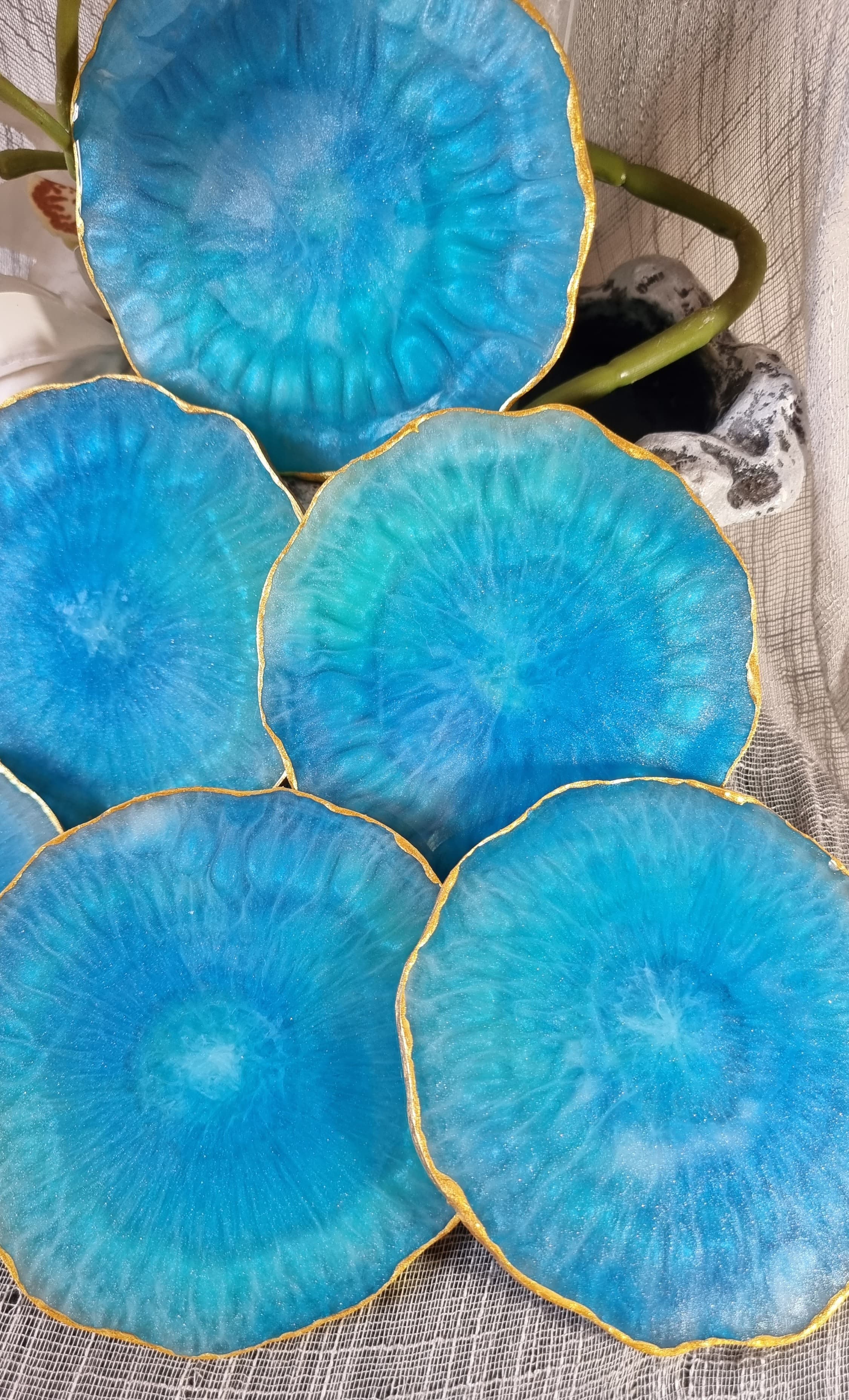 Epoxy-resin coasters in blue colour 