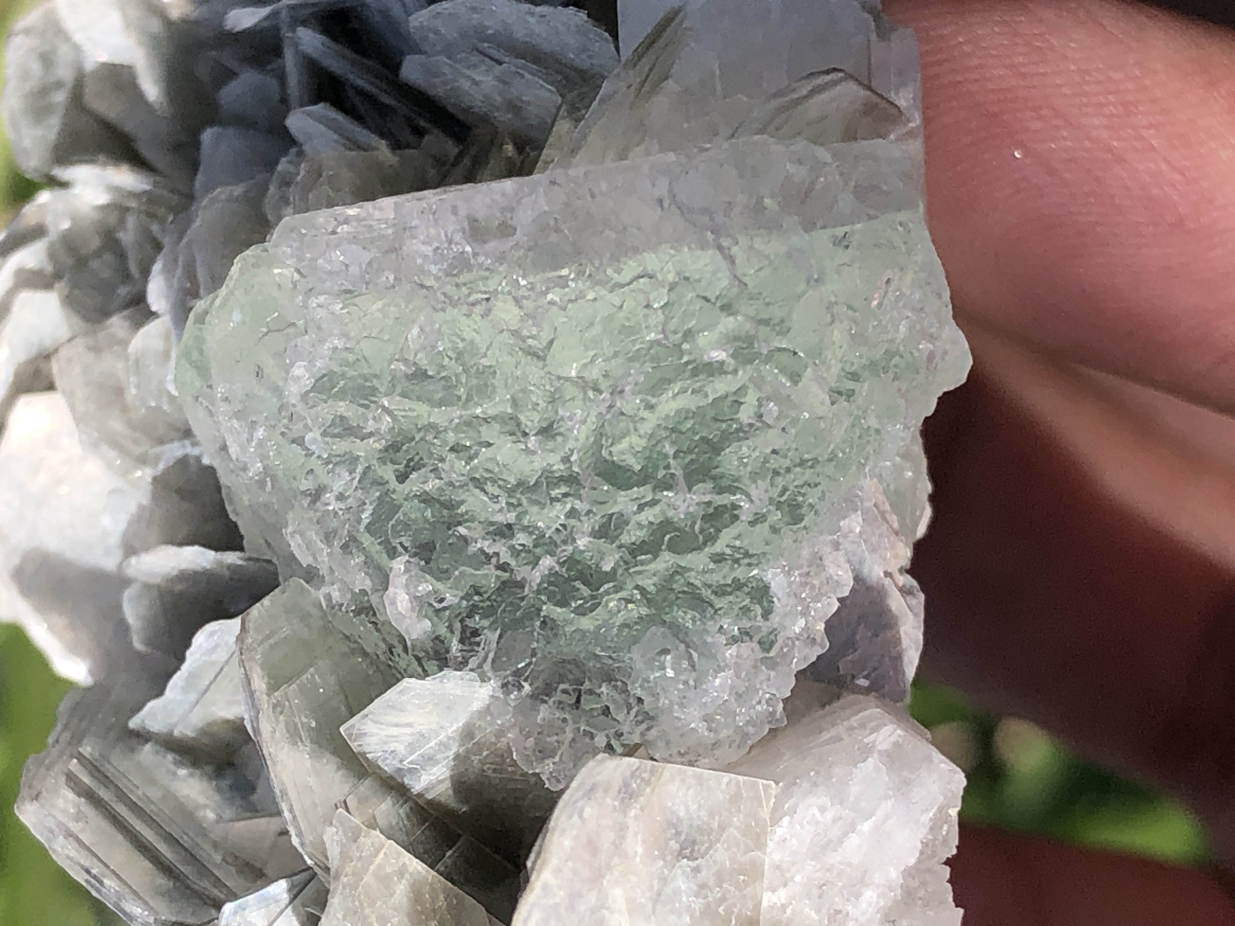 An Aesthetic Green Fluorite Sphere Rested on Flower Shape Muscovite.