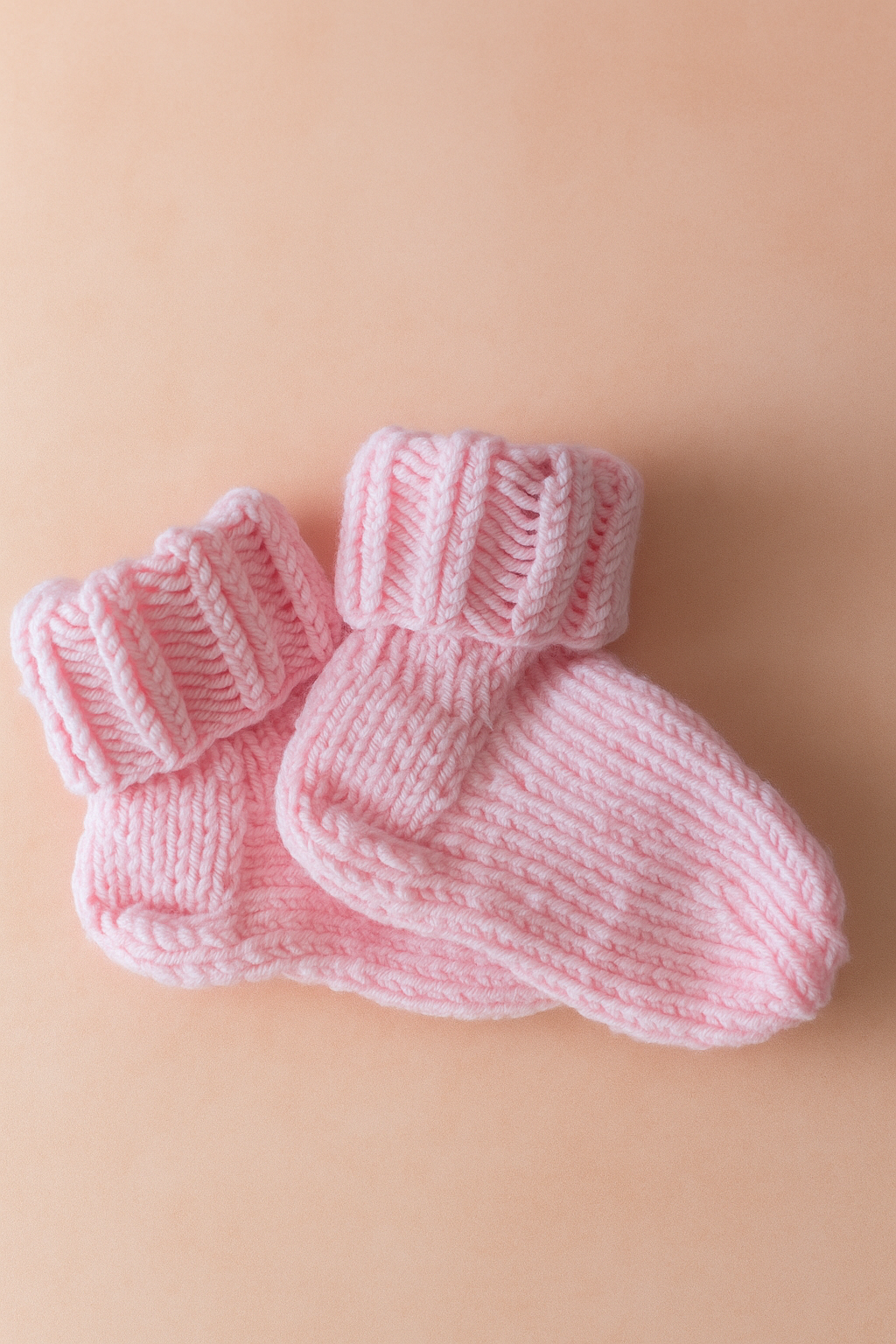 Rožinės kūdikių kojinytės