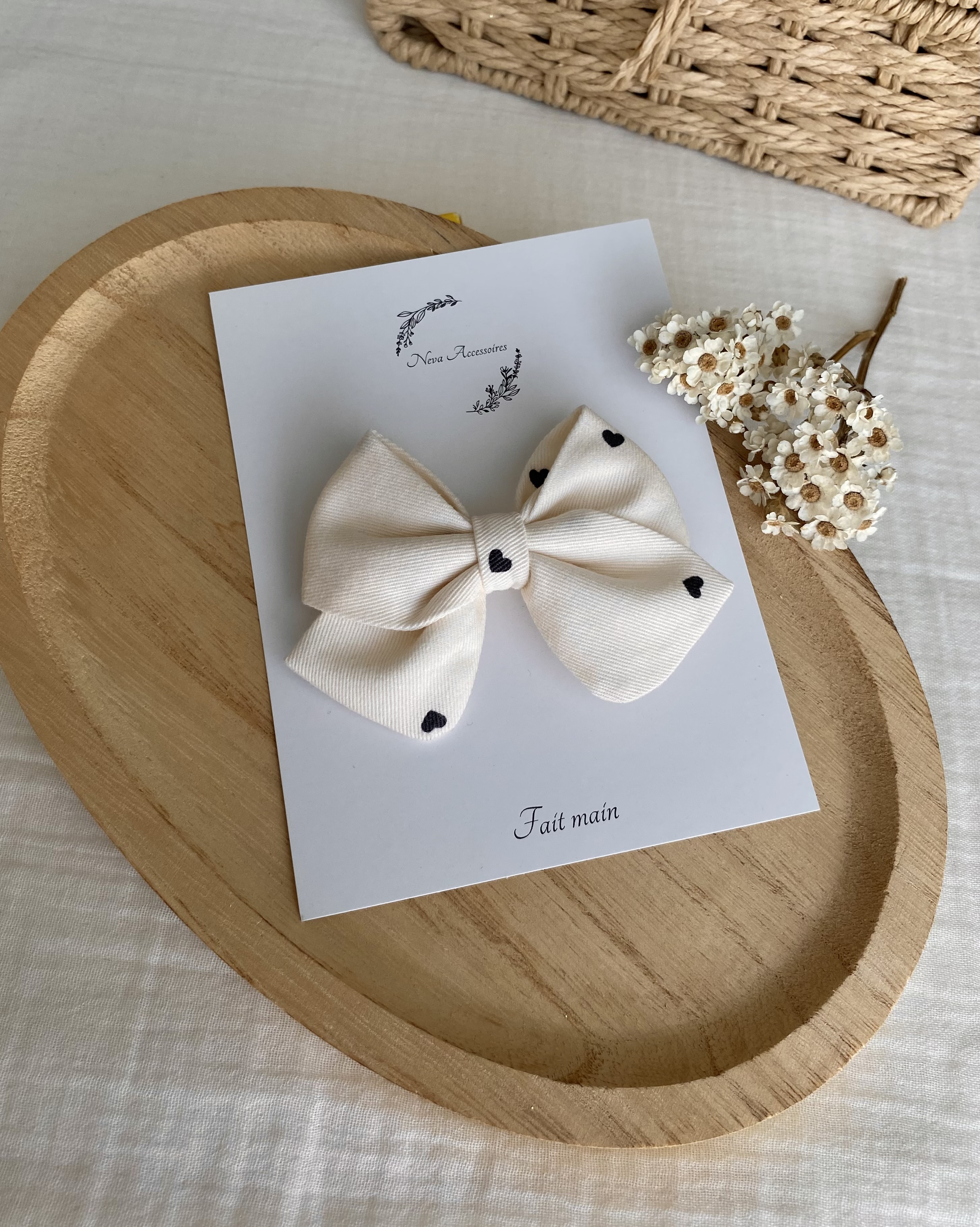 Noeud petit coeur noir L