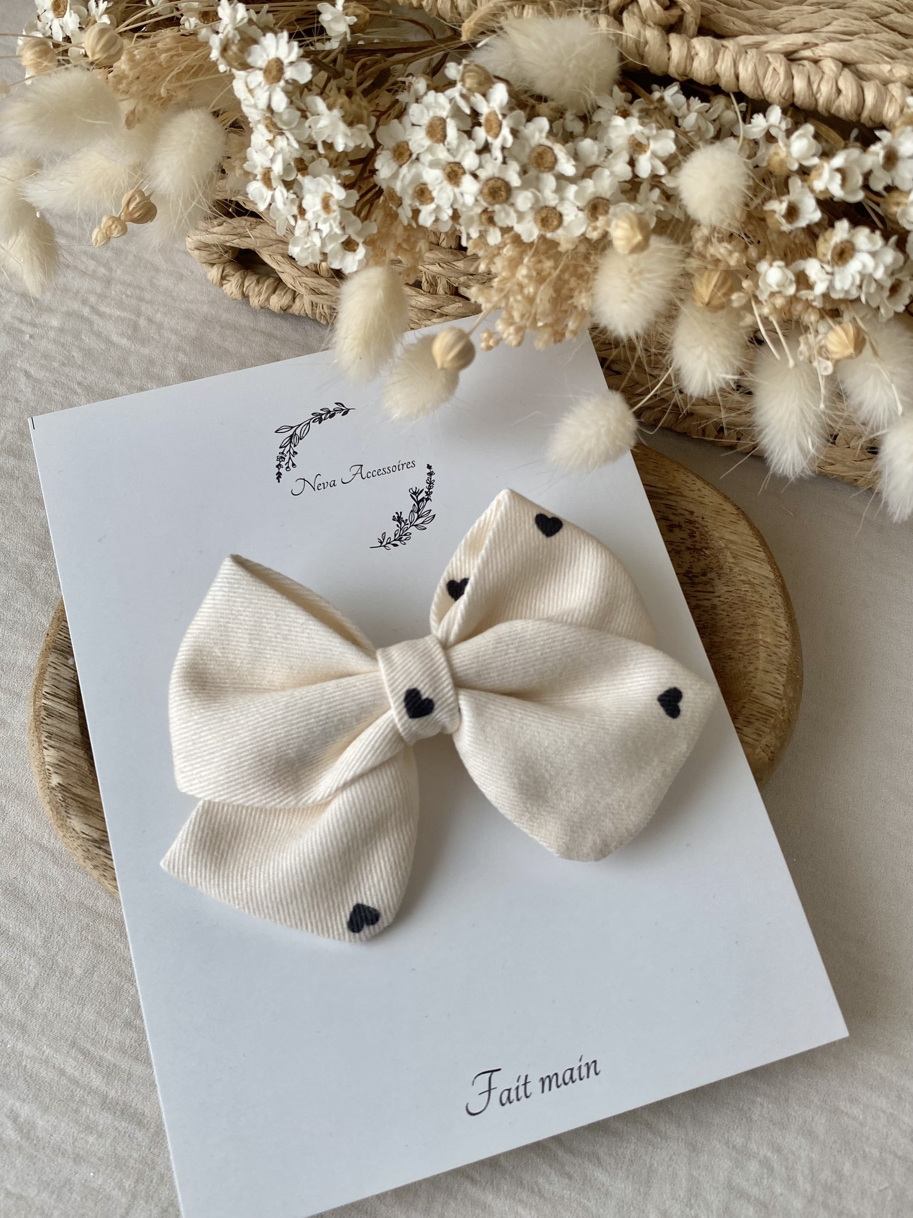 Noeud petit coeur noir M